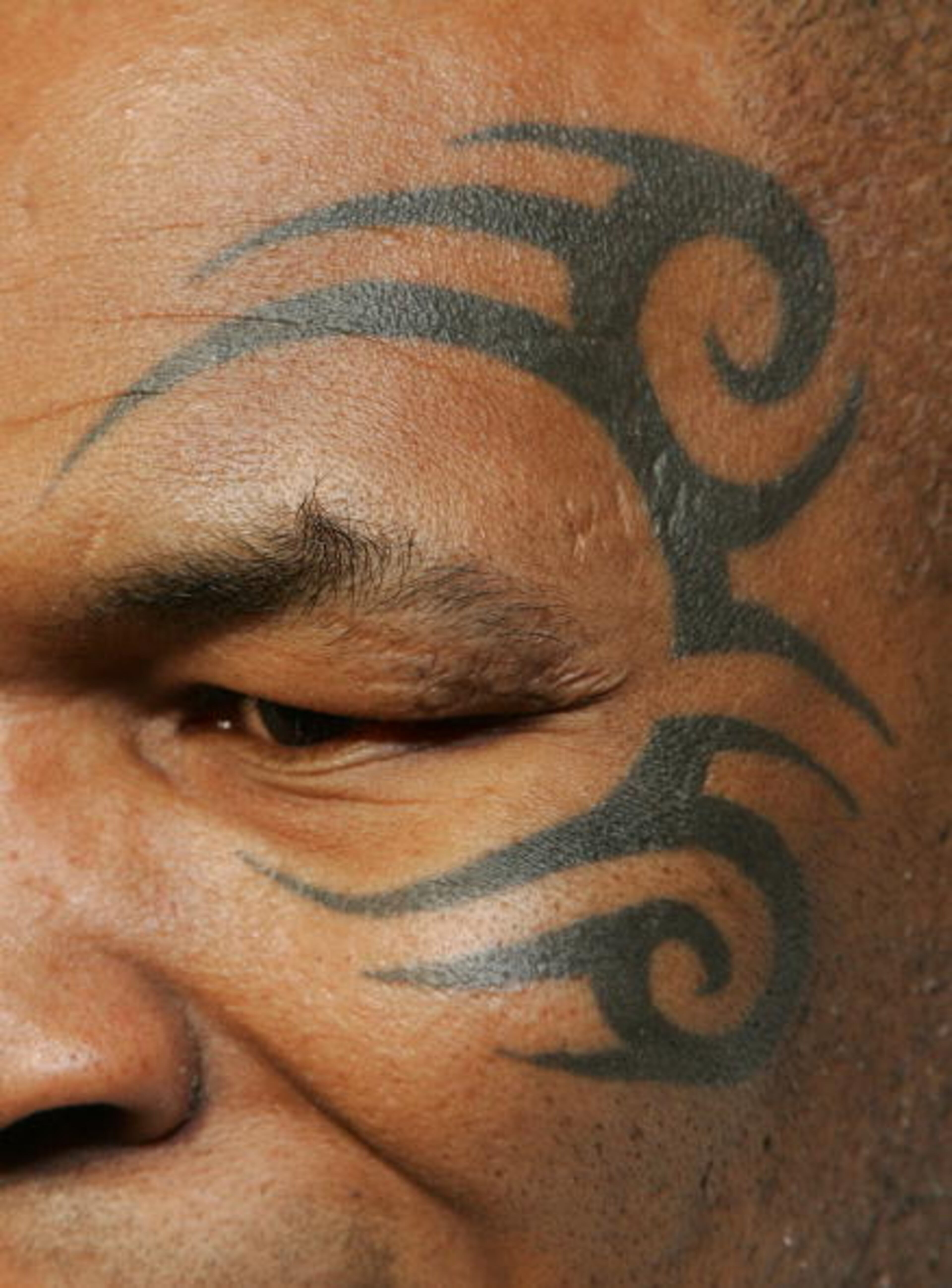 LAS VEGAS - JANUARY 25: Former boxer Mike Tyson arrives at a birthday party for mixed martial arts fighter Tito Ortiz hosted by his girlfriend Jenna Jameson at the CatHouse at the Luxor Resort & Casino January 25, 2008 in Las Vegas, Nevada. Ortiz turned 33 on January 23rd. (Photo by Ethan Miller/Getty Images)