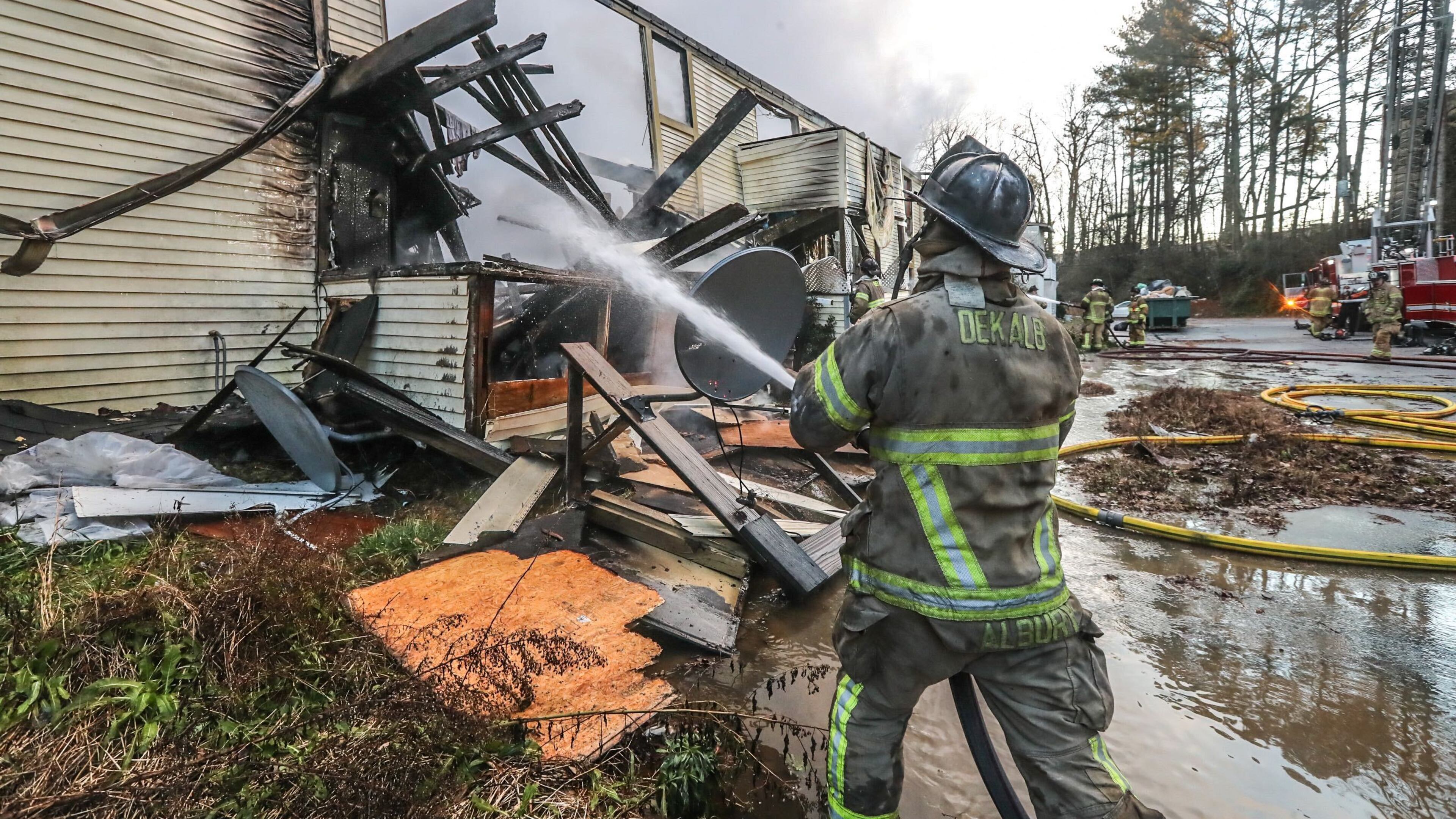 A fire destroyed several units at a DeKalb County condo complex Monday morning. (John Spink / john.spink@ajc.com)