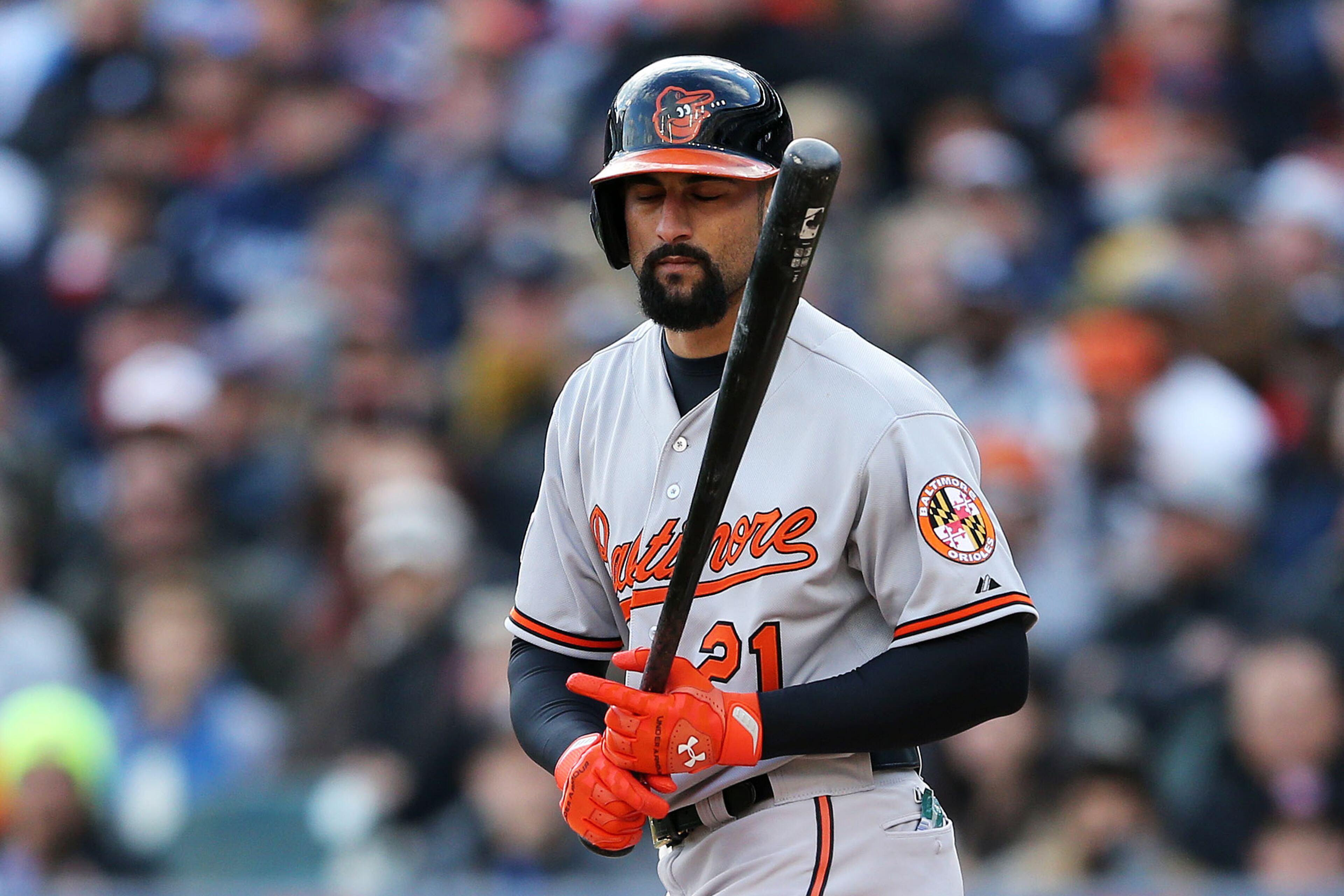 Nick Markakis #21 of the Baltimore Orioles reacts as he strikes out to end the top of the fifth inning against the Detroit Tigers during Game Three of the American League Division Series at Comerica Park on October 5, 2014 in Detroit, Michigan. (Photo by Leon Halip/Getty Images)