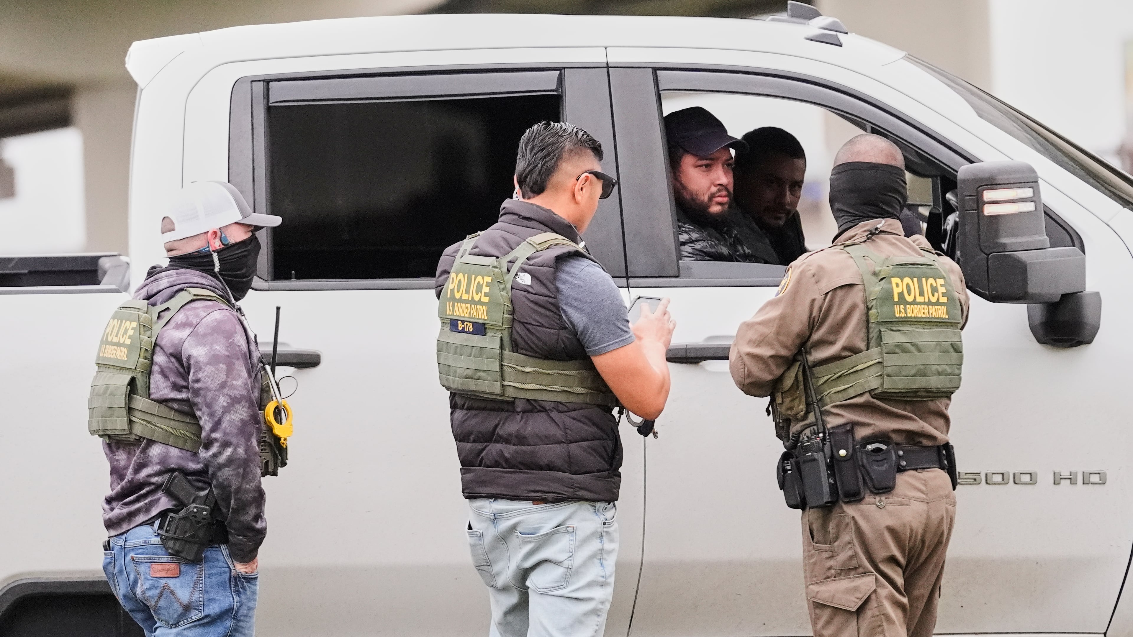 Customs and Border Patrol agents question occupants of a vehicle they pulled over, during an immigration crackdown in Kenner, La., Dec. 5, 2025. (Gerald Herbert/AP, File)