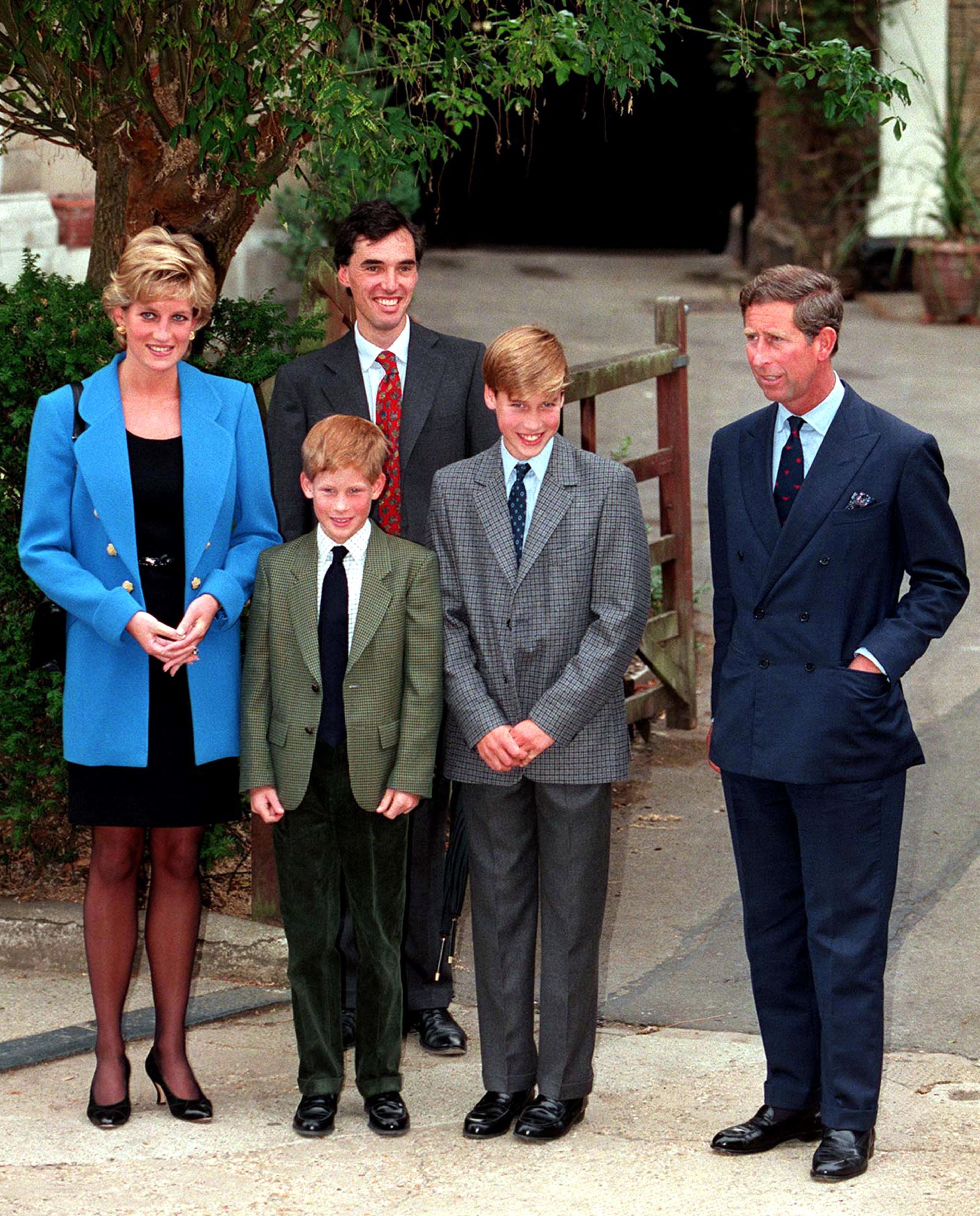 The Prince and Princess of Wales and family outside Manor House at Eton College with housemaster Dr Andrew Gailey on Prince William's first day at the school, September 1995. Left to right: Princess Diana (1961 - 1997), Prince Harry, Andrew Gailey, Prince William and Prince Charles. (Photo by Jayne Fincher/Getty Images)