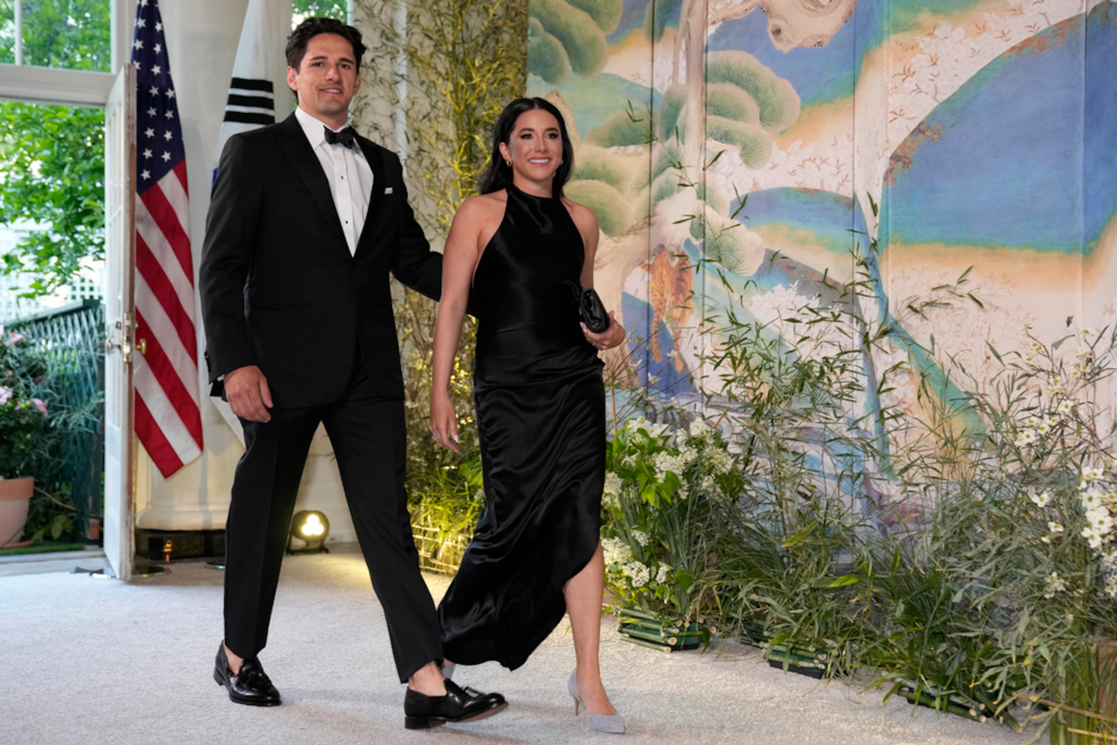 Jacob Snow and Samantha Cohen arrive for the State Dinner with President Joe Biden and the South Korea's President Yoon Suk Yeol at the White House, Wednesday, April 26, 2023, in Washington. (AP Photo/Alex Brandon)