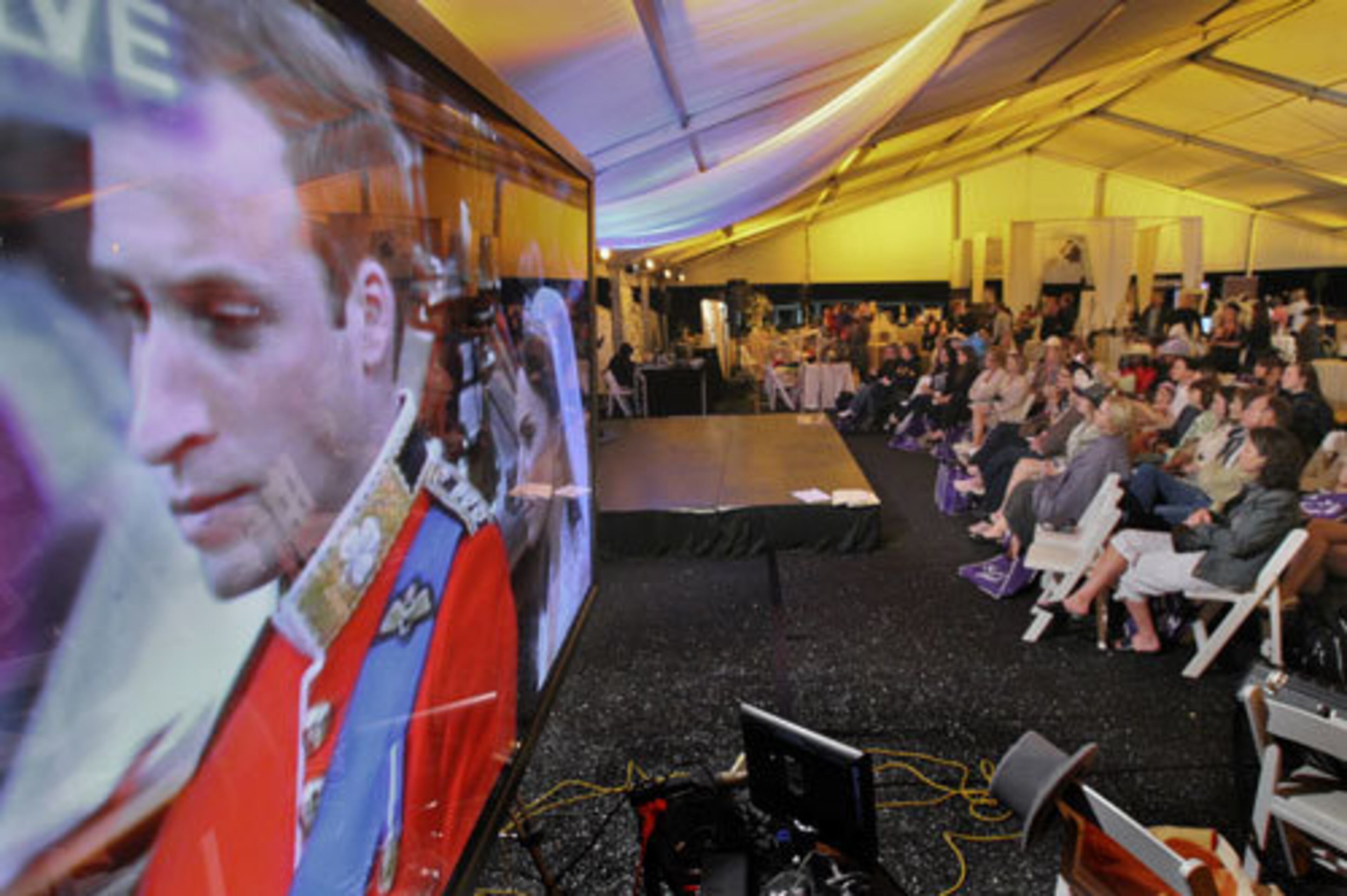 The crowd watched the event on large screen TVs. The Royal Wedding at Piedmont Park celebrated the wedding of Prince William to Kate Middleton under a grand tent overlooking the brand new Legacy Fountain in Piedmont Park, Friday, April 29, 2011.