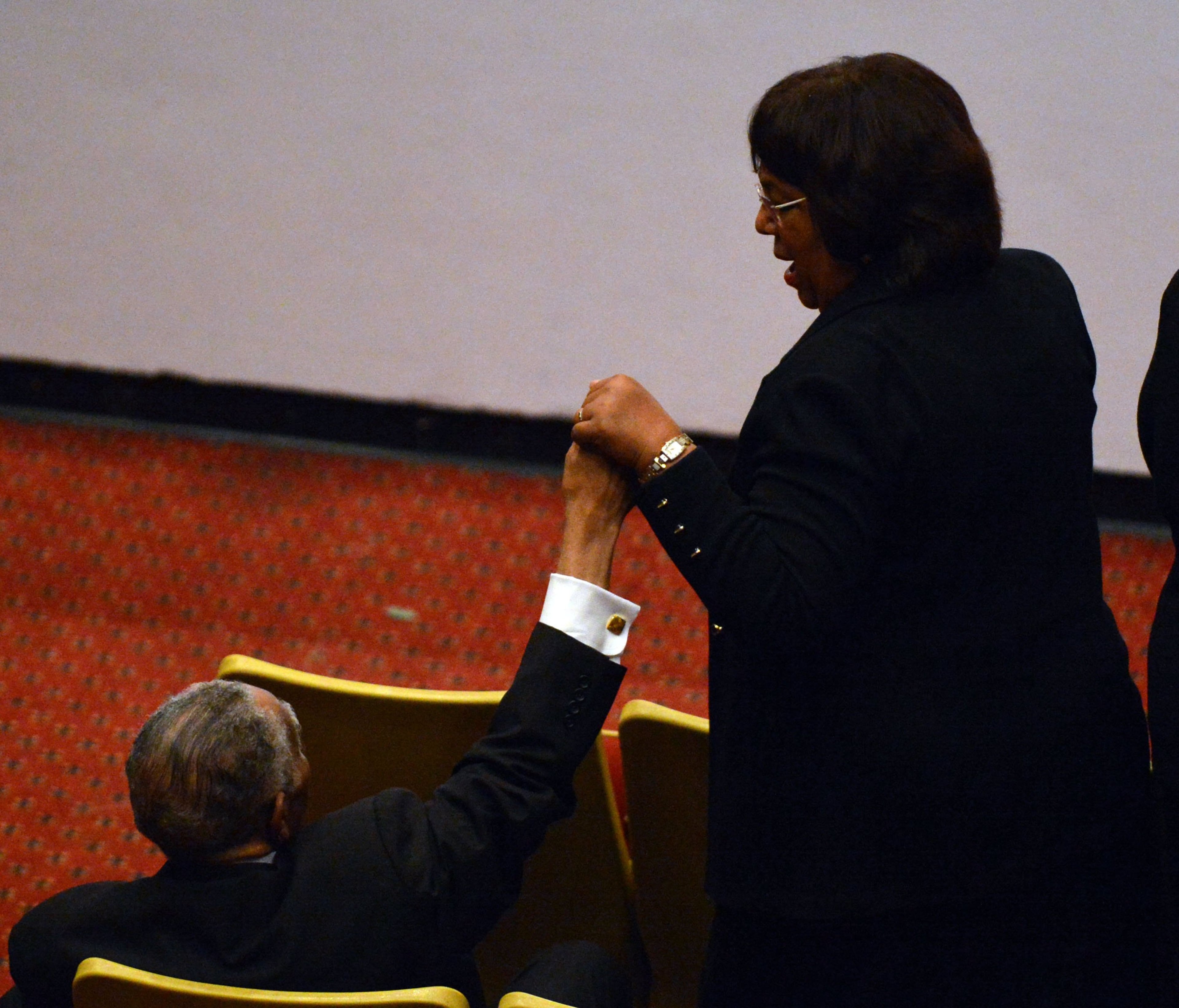 Rev Joseph Lowery holds his daughter's hand while the congregational hymn " Blessed Assurance" is sung during the homegoing celebration for Mrs. Evelyn Gibson Lowery held in the Martin Luther King Jr. International Chapel on the Morehouse College Campus, Wednesday, October 2, 2013. Lowery was the founder of the S.C.L.C.\WOMEN, Inc., the sister organization of the civil rights organization S.C.L.C; and creator of the annual Drum Major for Justice Awards and the annual Evelyn G. Lowery Civil Rights Heritage Educational Tour. She was married to civil rights activist the Reverend Joseph E. Lowery for close to 70 years. KENT D. JOHNSON / KDJOHNSON@AJC.COM