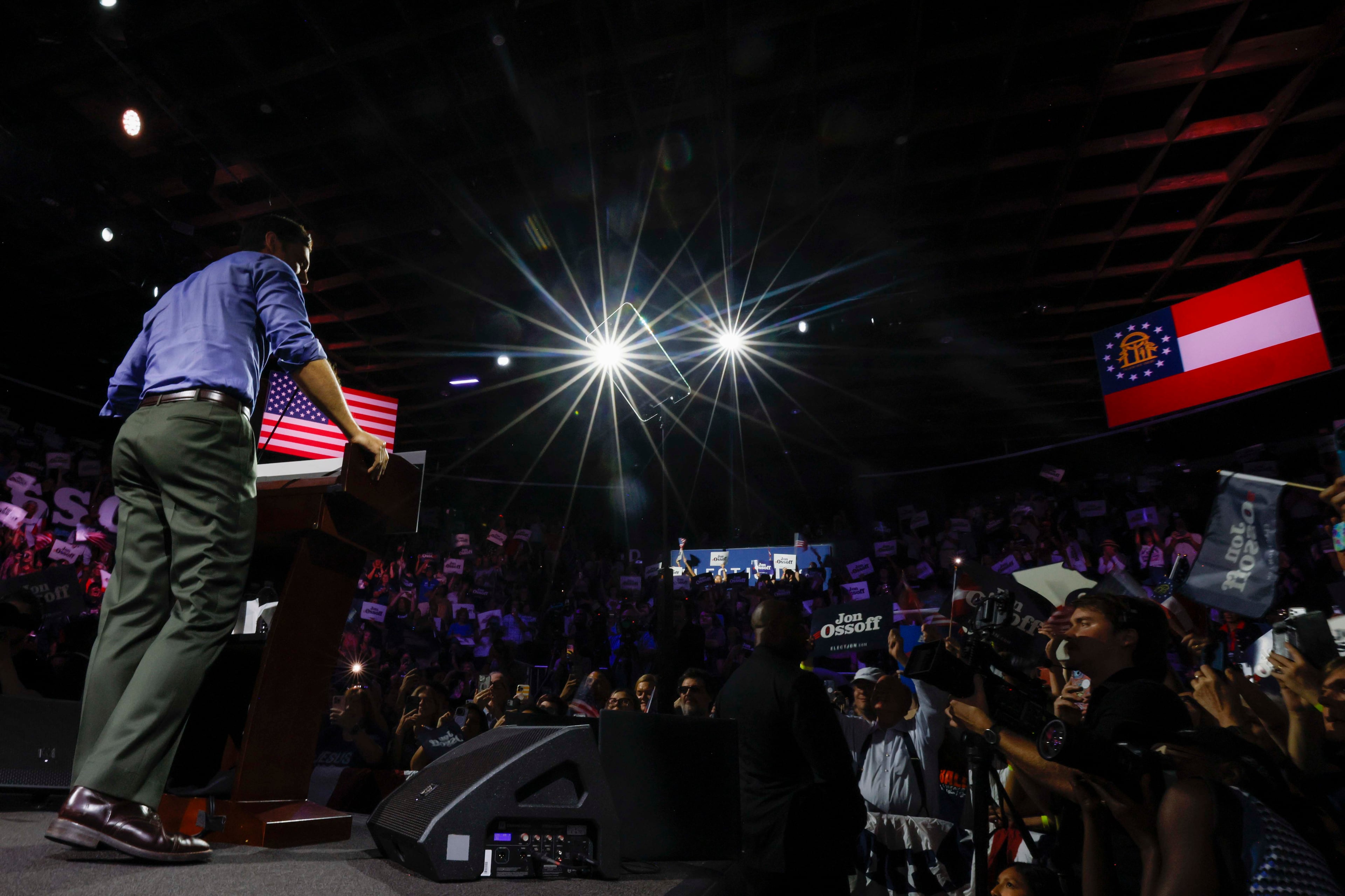 U.S. Sen. Jon Ossoff is seen at the start of a campaign rally at the Center Stage Theater in Atlanta last month. (Miguel Martinez/AJC)