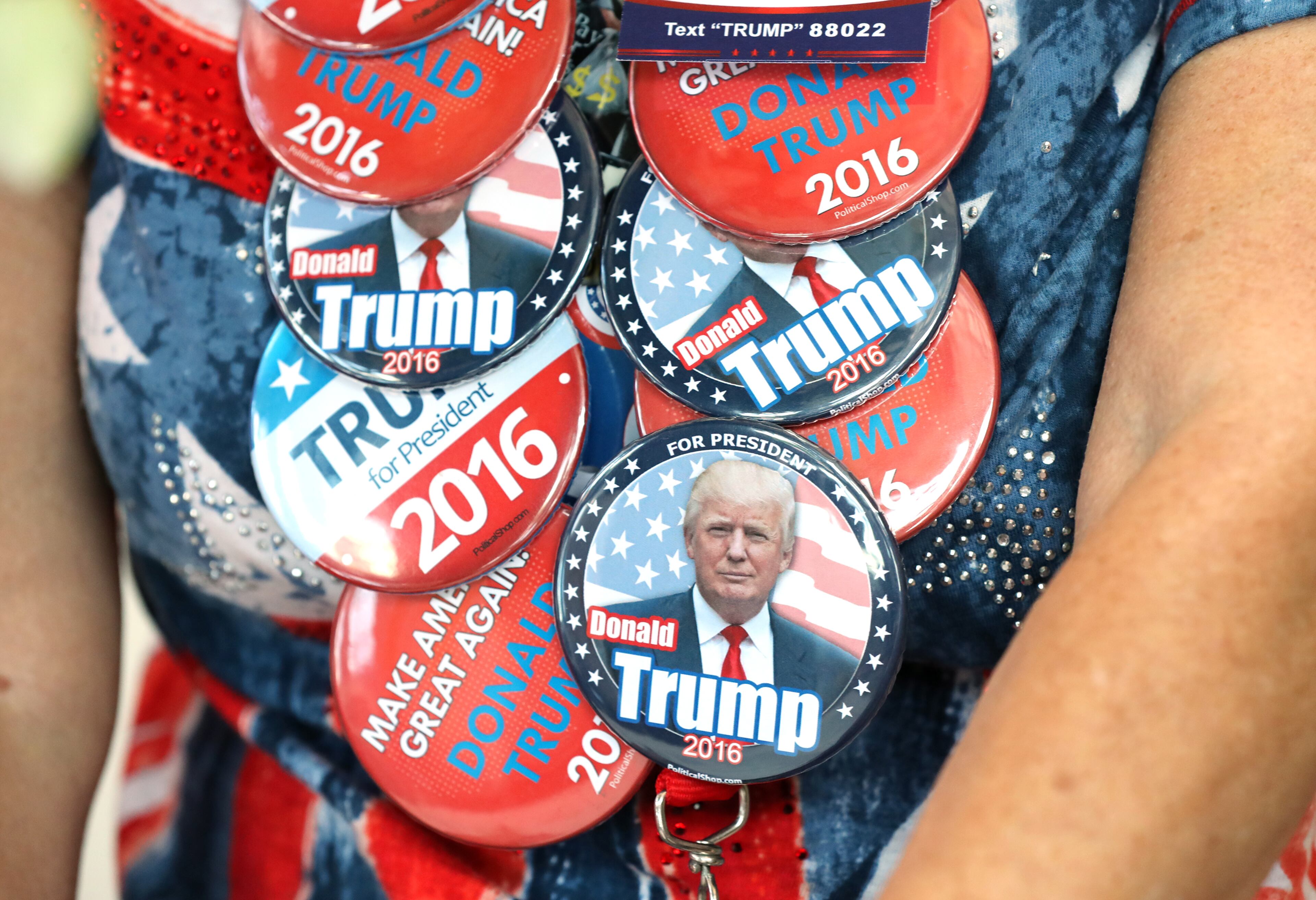 Trump supporter Phyllis Slaght wears an assortment of buttons during Republican Vice Presidential nominee Mike Pence's campaign stop at the Cobb-Marietta Coliseum & Exhibit Hall Authority on Monday, August 29, 2016, in Marietta. Curtis Compton /ccompton@ajc.com