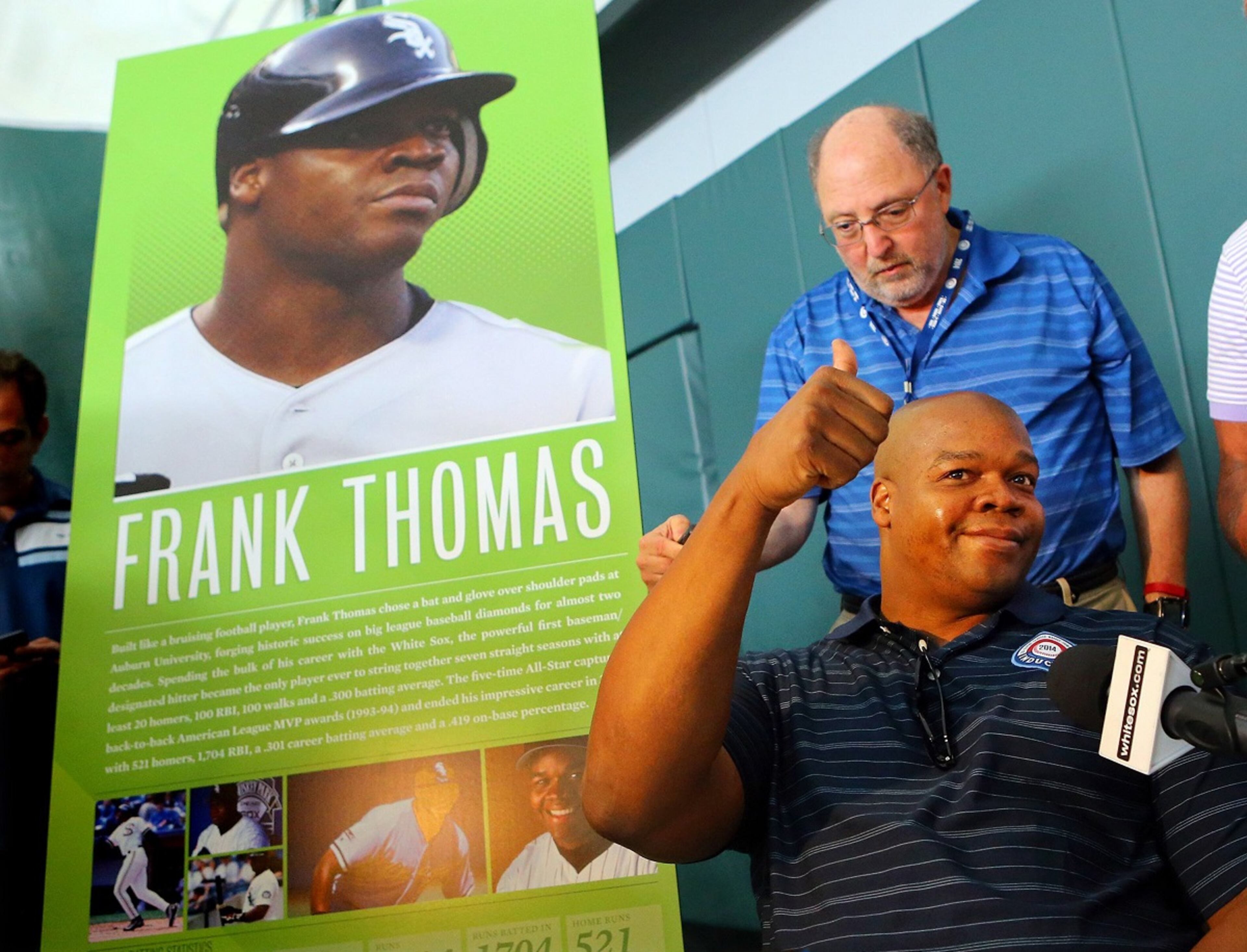 Frank Thomas gives a thumbs-up while answering questions.