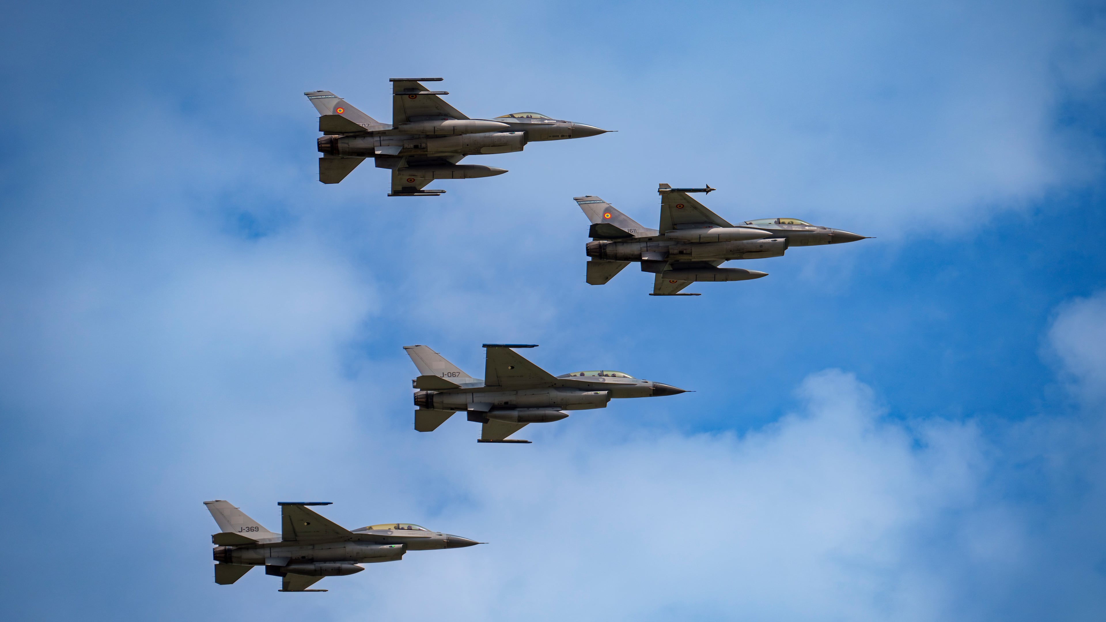 FILE - F16 fighter jets of the Romanian Air Force and the Romania based European F-16 Training Center (EFTC), perform a fly-by at the Black Sea, Defense, Aerospace and Security (BSDA) international exhibition in Bucharest, Romania, Wednesday, May 22, 2024. (AP Photo/Vadim Ghirda, File)