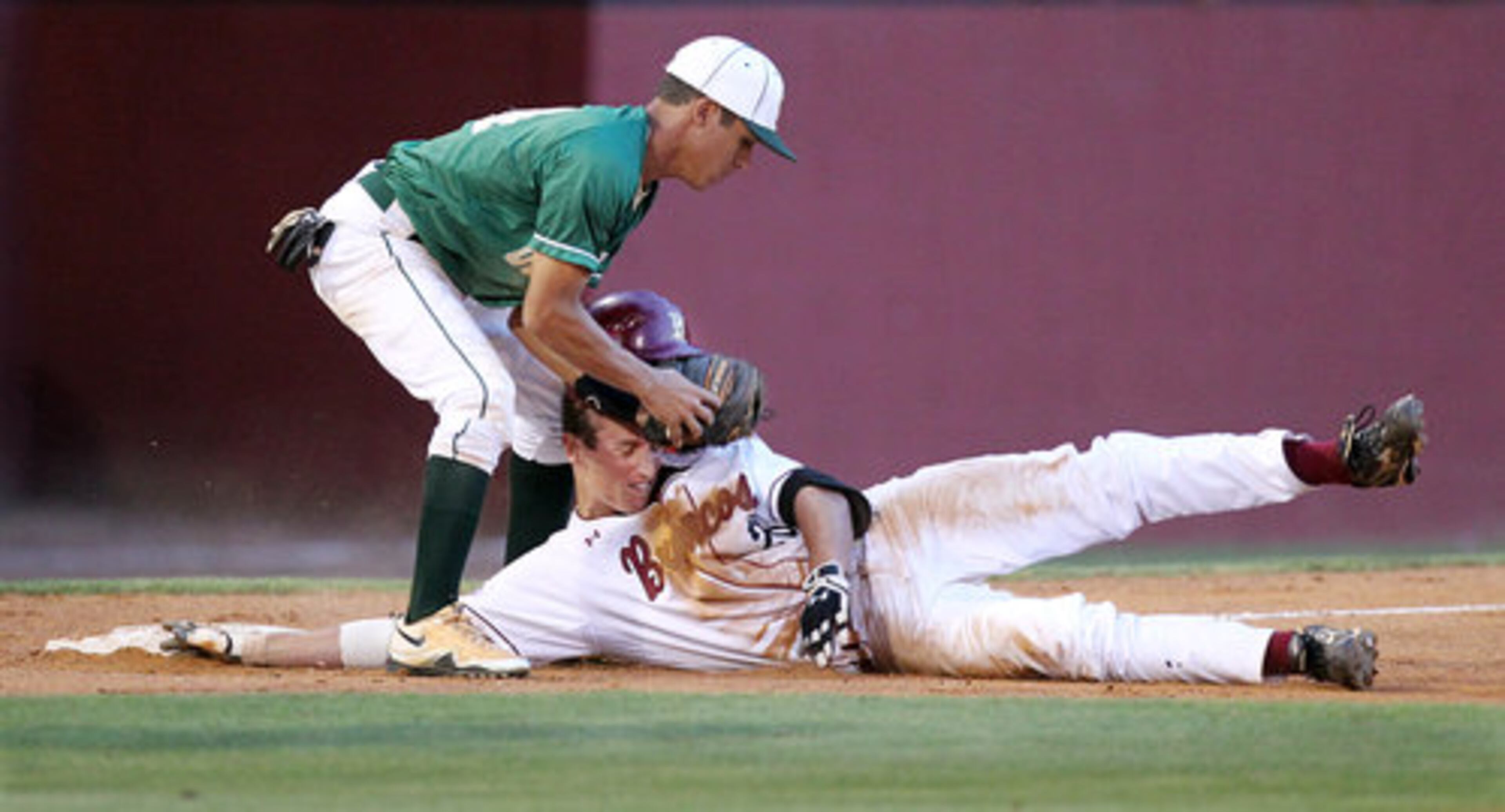 Grayson third baseman Oscar Valdez tags out Brookwood Lucas Sims sliding into third trying to reach for a triple during 4th inning action in game two of a double header at Brookwood High School in Snellville on Monday, May 21, 2012. Grayson won the game 3-1 to even the series and force a game three.