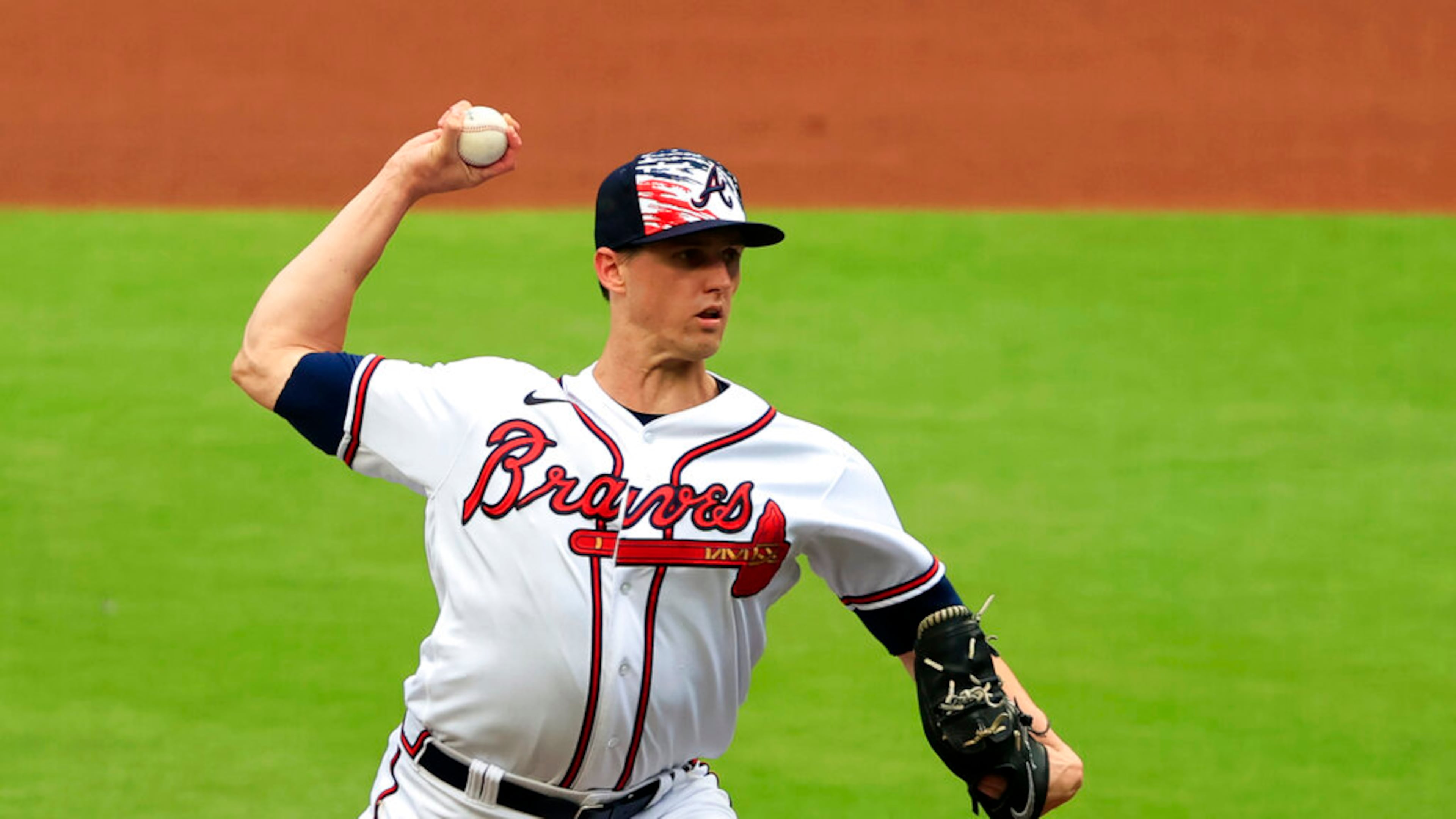 Atlanta Braves starting pitcher Kyle Wright throws during the first inning of a baseball game Monday, July 4, 2022, in Atlanta. (AP Photo/Butch Dill)
