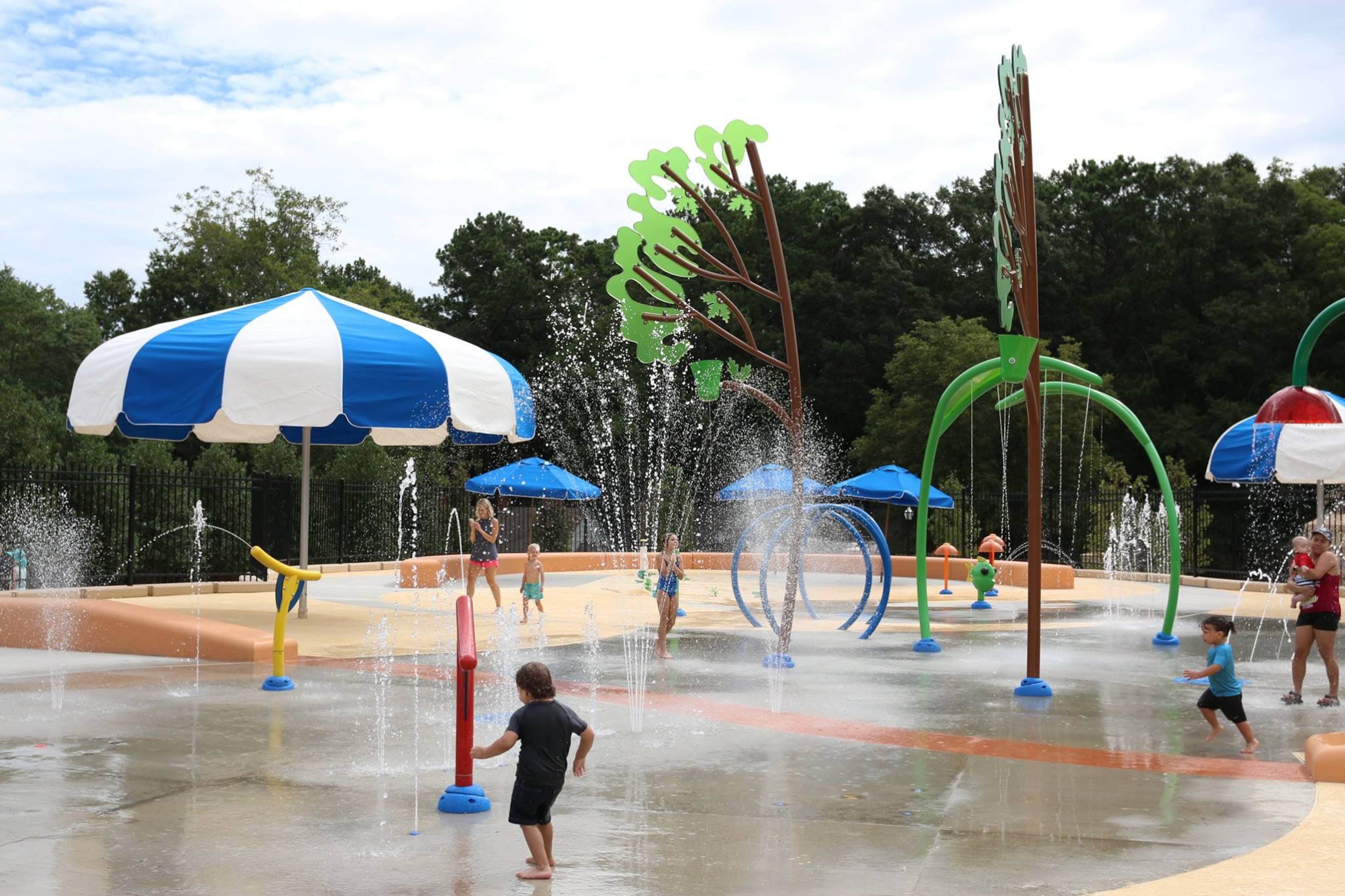 The sprayground at Elizabeth Porter Park in Marietta lets kids cool off with plenty of sprays and features like water cannons. (Courtesy of Maggi Moss/Marietta Parks & Recreation)
