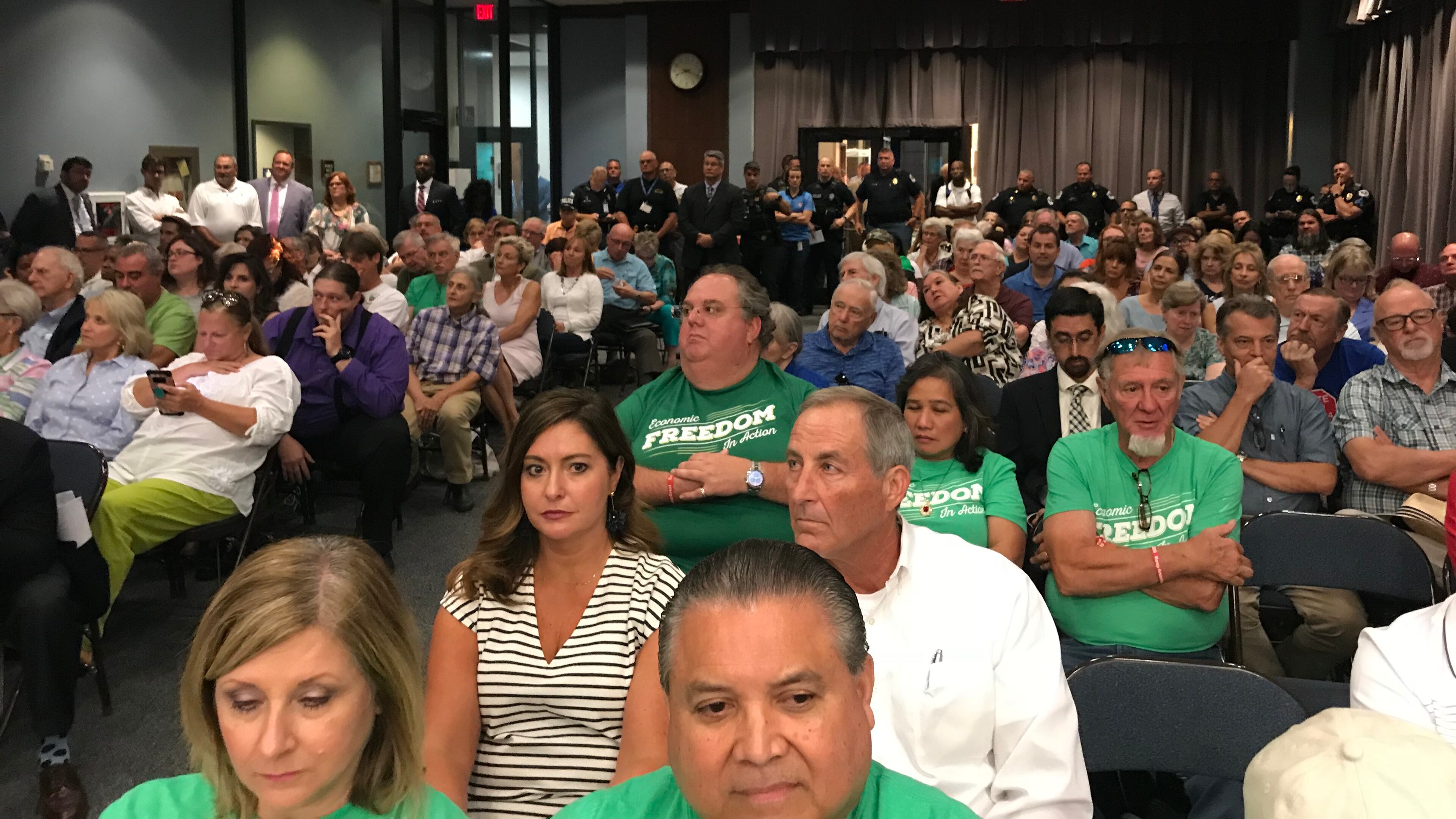 more than a hundred Cobb residents turned out for the county commission vote on the millage rate (Meris Lutz/AJC)