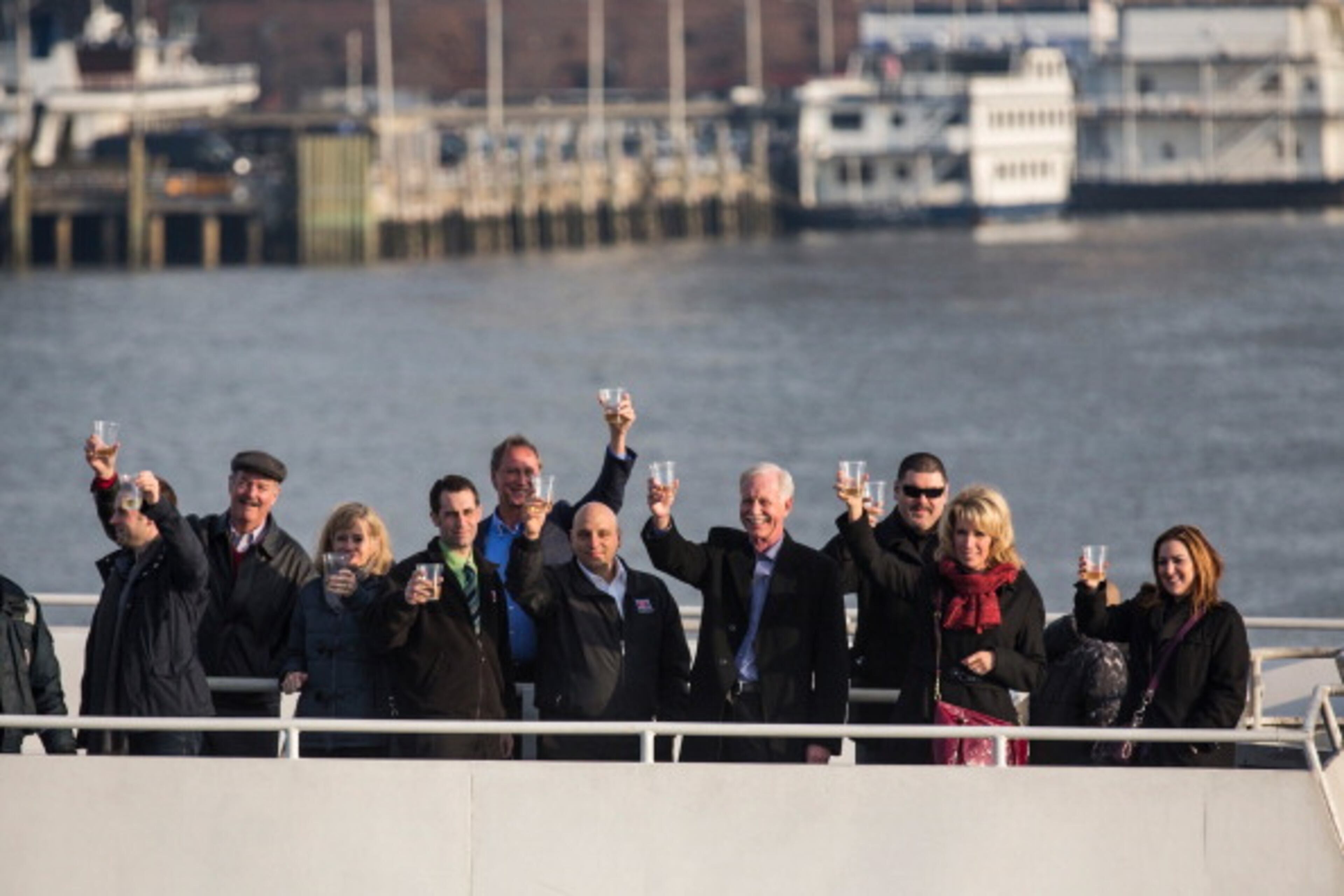 NEW YORK, NY - JANUARY 15: Chesley "Sully" Sullenberger, a retired airline captain famous for landing a commercial jet on the Hudson River, along with passengers and crew members from the flight, raise glasses of champagne on a New York Waterway ferry in the middle of the Hudson River to celebrate the five year anniversary of "The Miracle on the Hudson" at a press conference and photo opportunity on January 15, 2014 in New York City. On January 15, 2009, Sullenberger took off from La Guardia airport while piloting US Airways Flight 1549 with 150 passengers and five crew members. The plane hit a goose shortly after take off, forcing Sullenberger to land the plane in the Hudson River; no one was killed. (Photo by Andrew Burton/Getty Images)