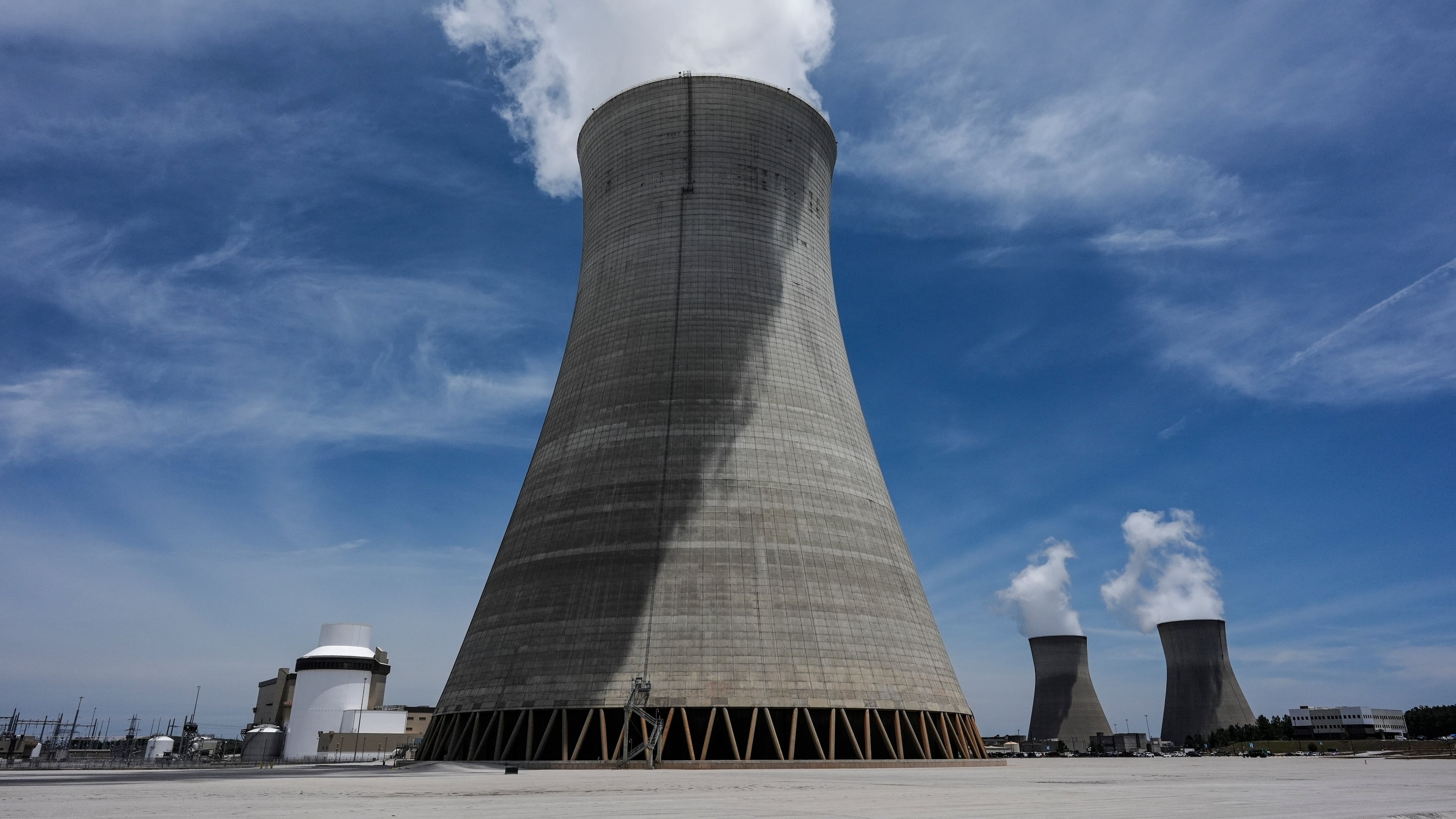 FILE - Cooling tower three with one and two in the background operate at the nuclear reactor facility at the Alvin W. Vogtle Electric Generating Plant, May 31, 2024, in Waynesboro, Ga. (AP Photo/Mike Stewart, File)