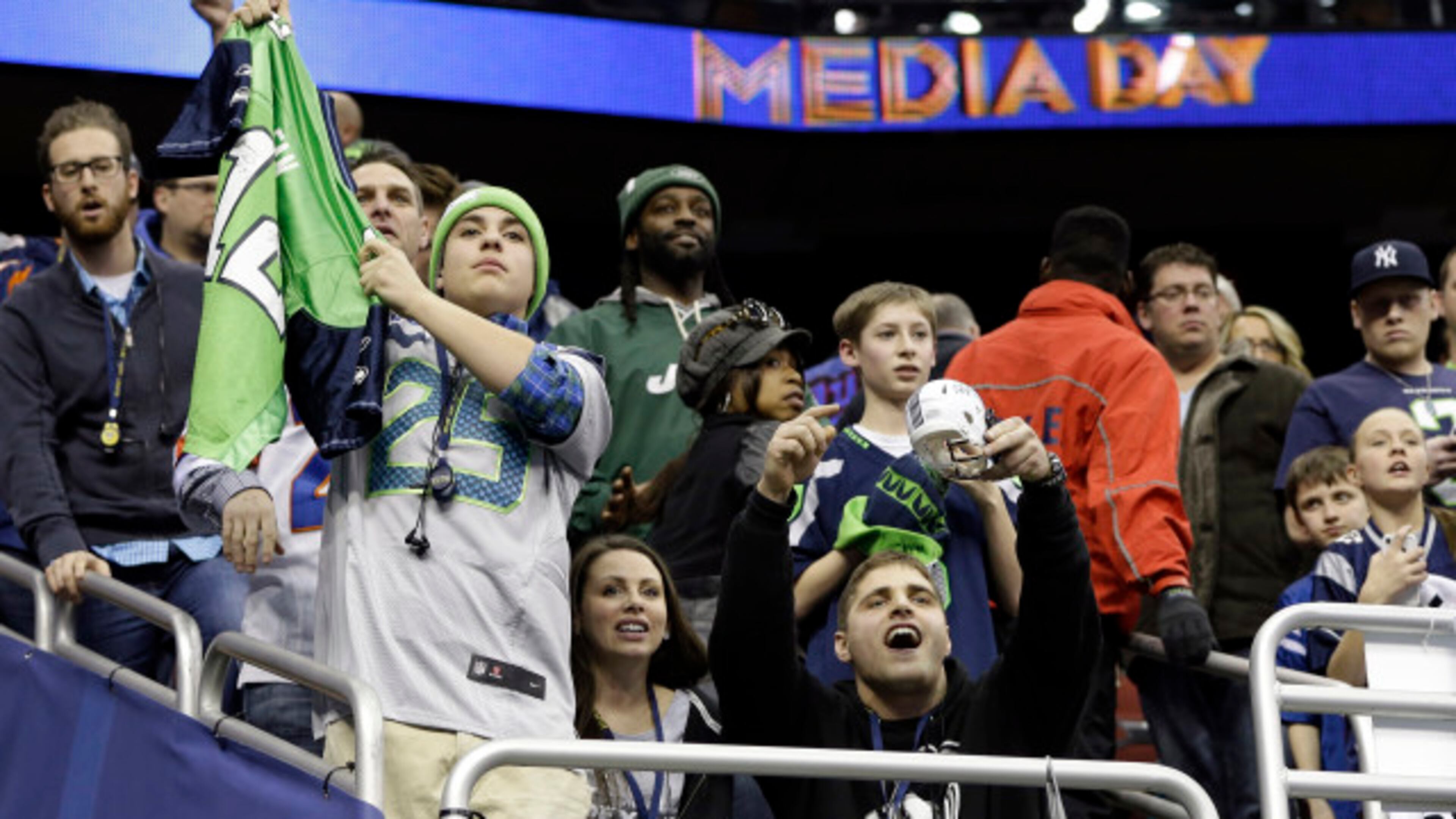 Seattle Seahawks fans cheer during media day for the NFL Super Bowl XLVIII football game Tuesday, Jan. 28, 2014, in Newark, N.J. (AP Photo/Mark Humphrey) Seattle Seahawks fans cheer during media day for the NFL Super Bowl XLVIII football game Tuesday, Jan. 28, 2014, in Newark, N.J. (AP Photo/Mark Humphrey)
