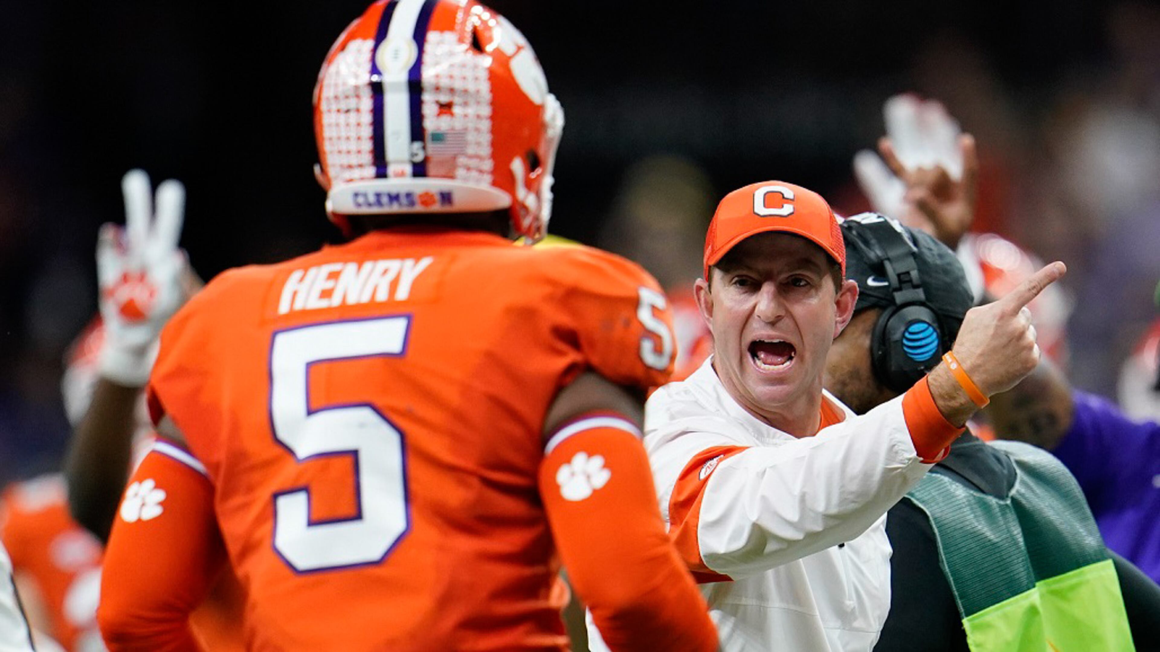 Clemson coach Dabo Swinney yells to Clemson defensive end K.J. Henry during the College Football Playoff championship game against LSU, Monday, Jan. 13, 2020, in New Orleans. (AP Photo/David J. Phillip)