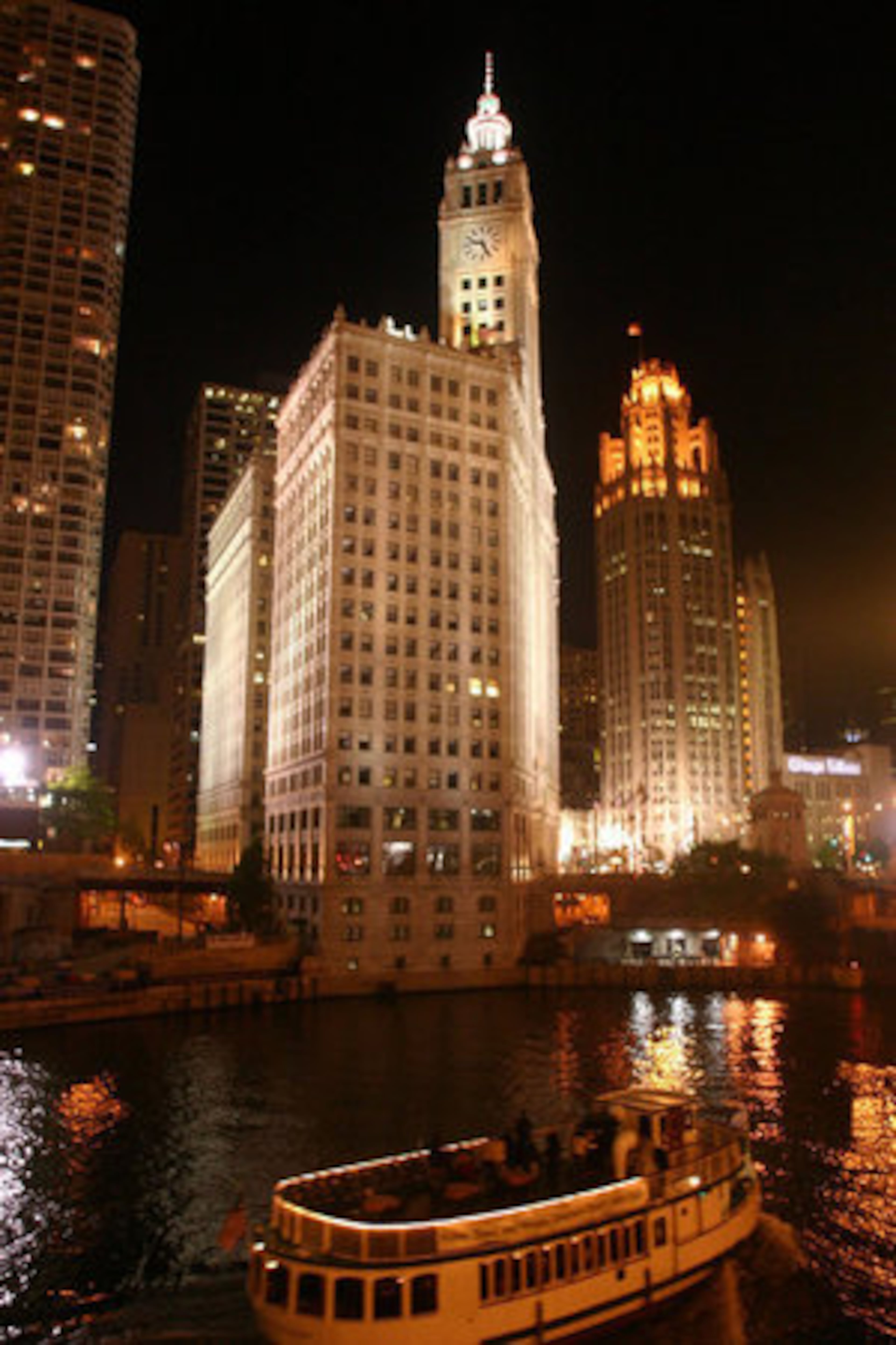 The Wrigley Building (left) and the Tribune Tower stand over the Chicago River as two of the city's classic skyscrapers.