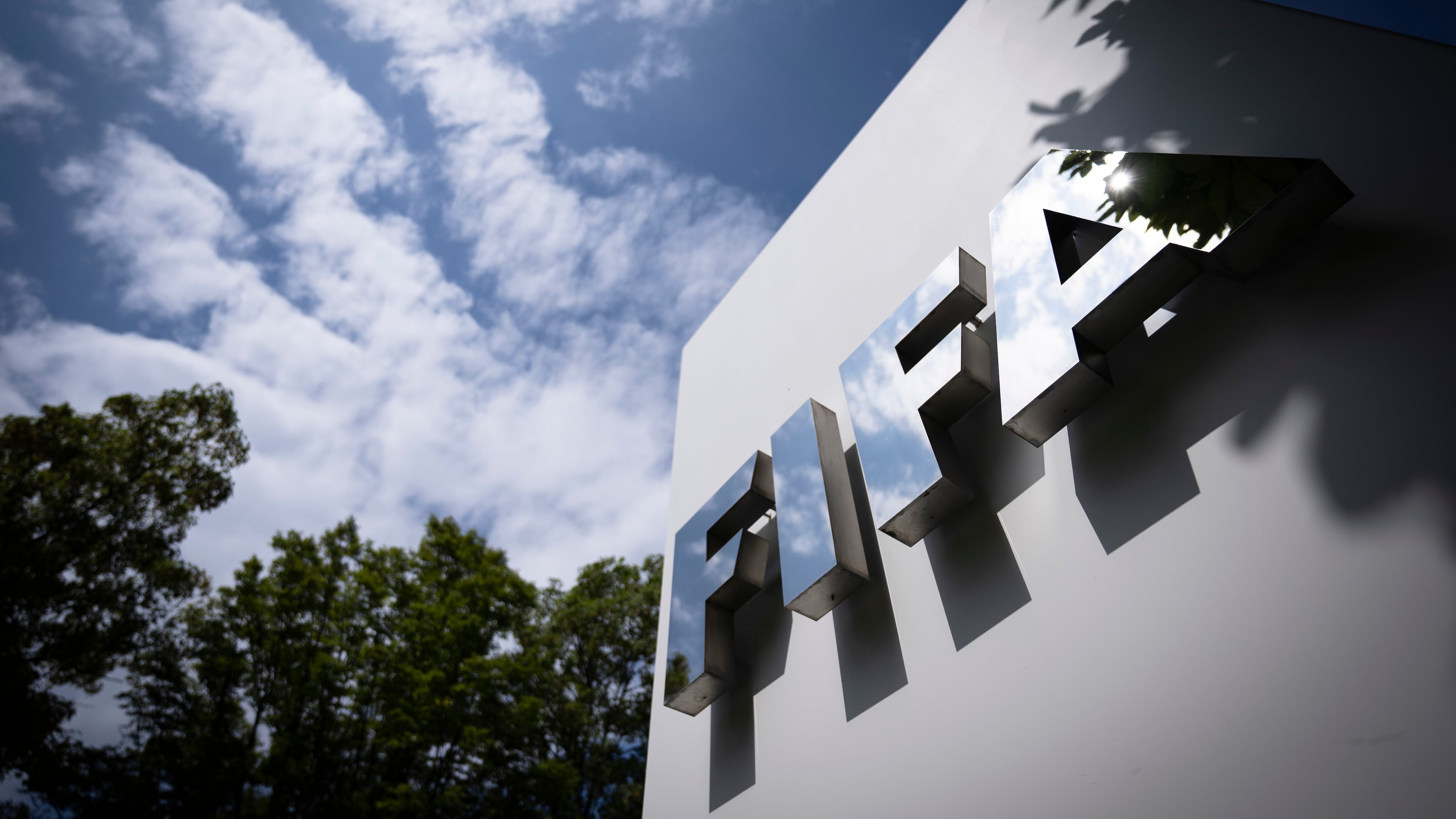FILE - The FIFA logo is seen at the entrance of FIFA headquarters in Zurich, Switzerland, Aug. 6, 2026. (Andreas Becker/Keystone via AP, File)