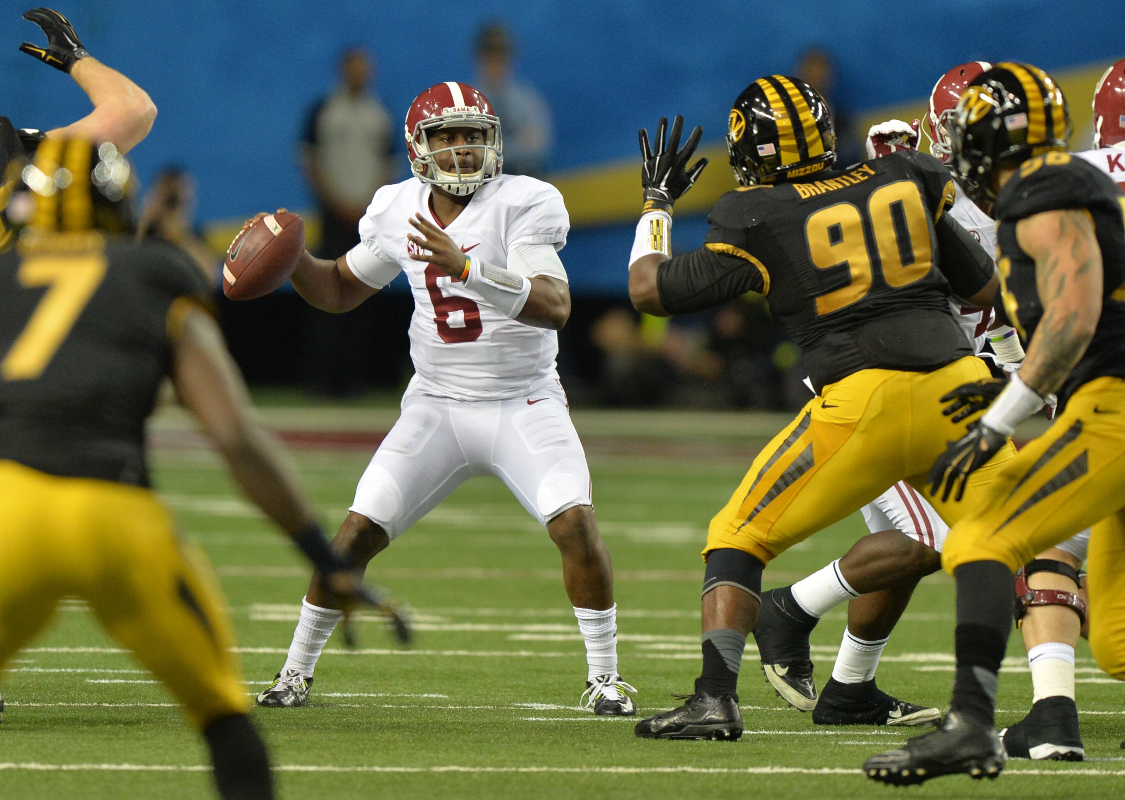 December 6, 2014 Atlanta: Alabama Crimson Tide quarterback Blake Sims looks down field against Missouri in the first half of the 2014 SEC Championship at the Georgia Dome Saturday December 6, 2014. BRANT SANDERLIN / BSANDERLIN@AJC.COM