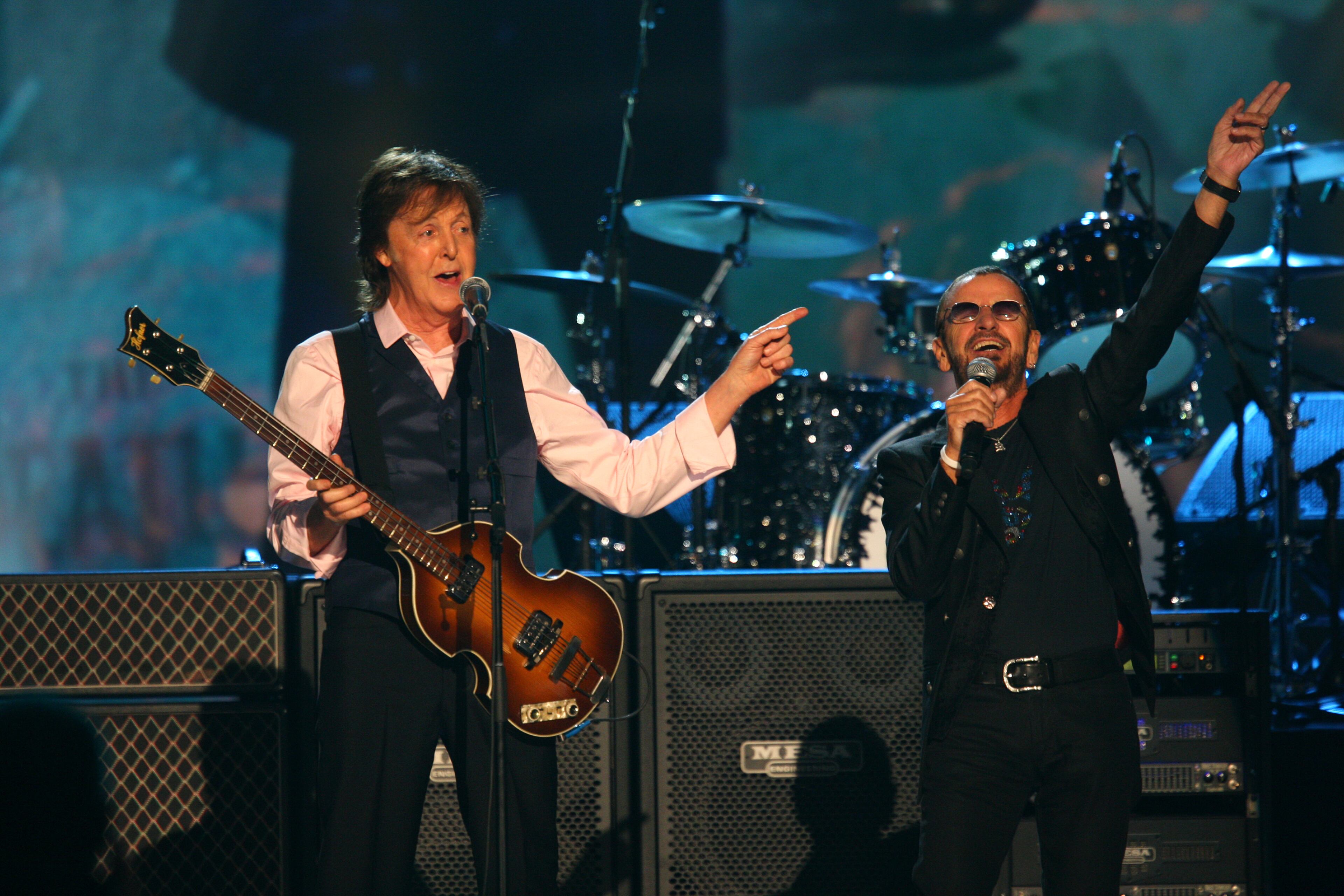 Paul McCartney and Ringo Starr perform at The Night that Changed America: A Grammy Salute to the Beatles, on Monday, Jan. 27, 2014, in Los Angeles. (Photo by Zach Cordner/Invision/AP)