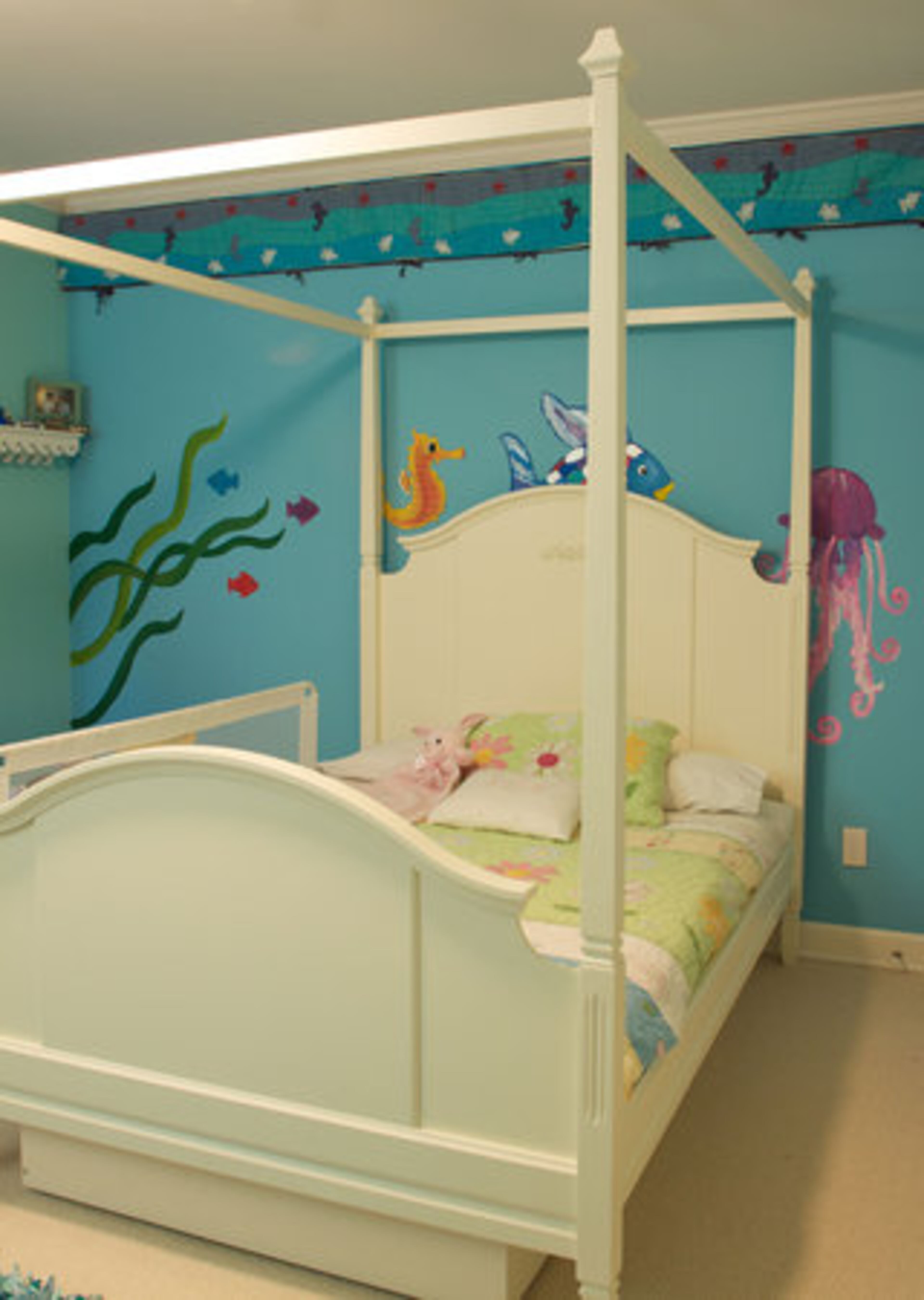 Miles and Kathy Graivier styled their daughter Sofia's room after the book, "Rainbow Fish." The mural, which was painted by a family friend, features fish added by Sofia's older brother Max, 9, and two of the Gravier's goddaughters.