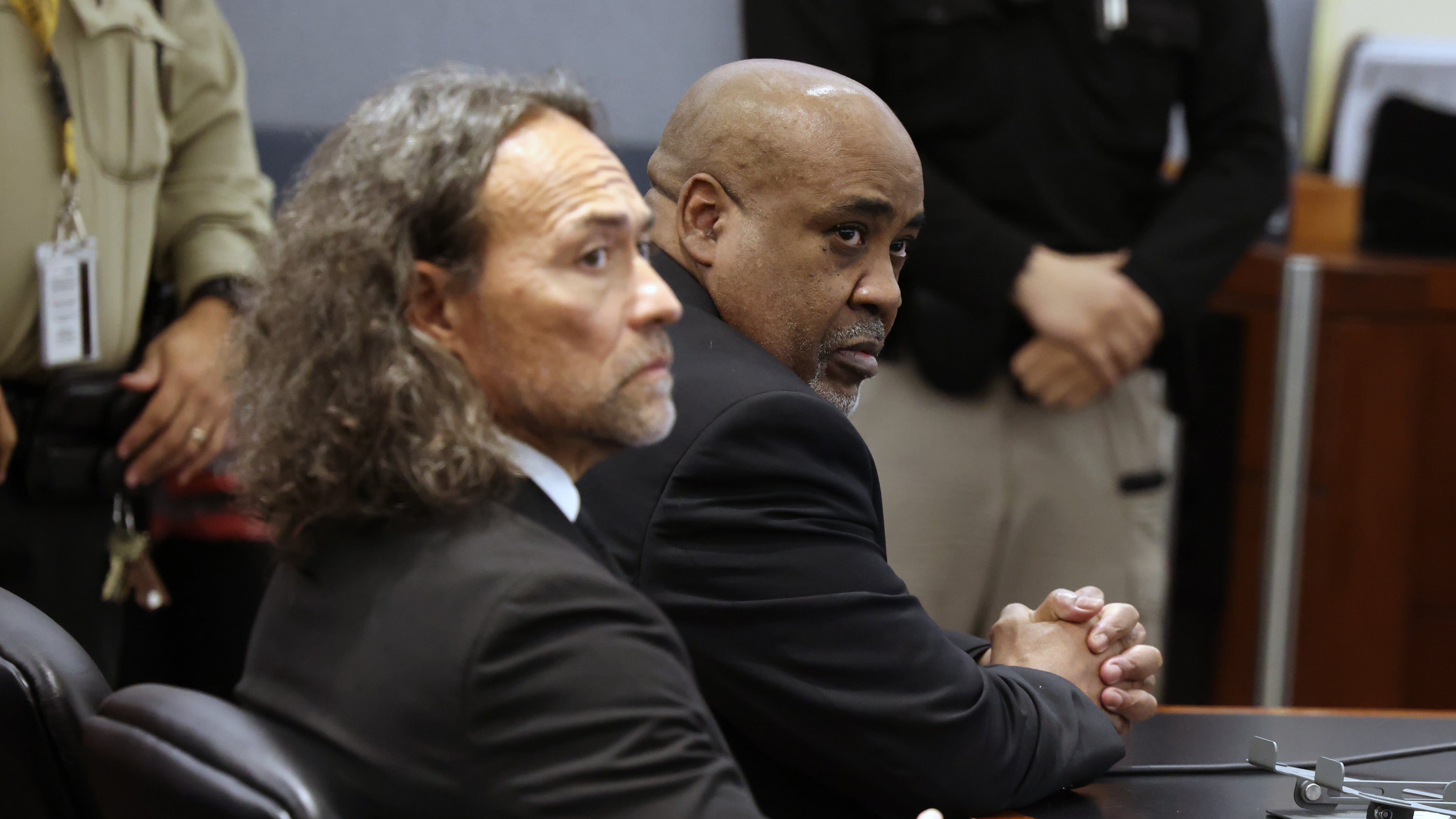 Duane Davis, right, and his attorney Michael Sanft sit in a courtroom after a jury found Davis guilty of first-degree murder in his trial related to the 1996 killing of rapper Tupac Shakur, at Clark County District Court Regional Justice Center, Monday, Aug. 31, 2026, in Las Vegas. (Bizuayehu Tesfaye/Las Vegas Review-Journal via AP, Pool)
