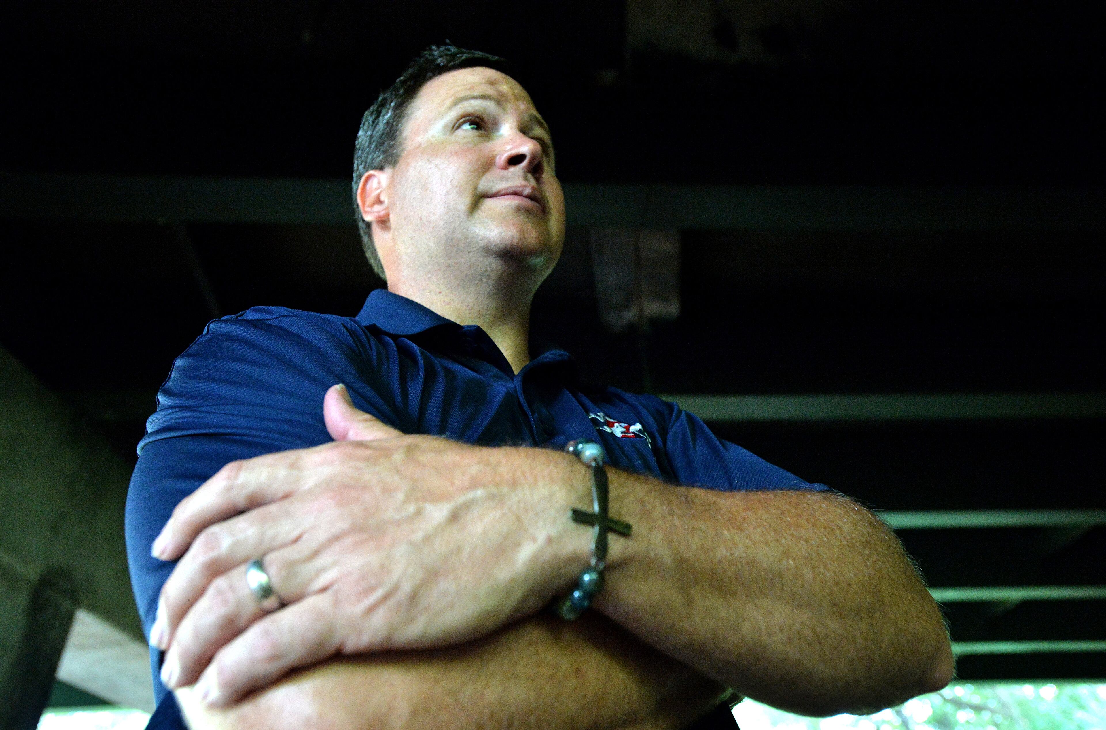 Jeremy Turner, executive director of Contribute2America, listens to Romariz Halley who is a homeless after he delivered foods, supplies and personal items near Buford Highway. HYOSUB SHIN / HSHIN@AJC.COM