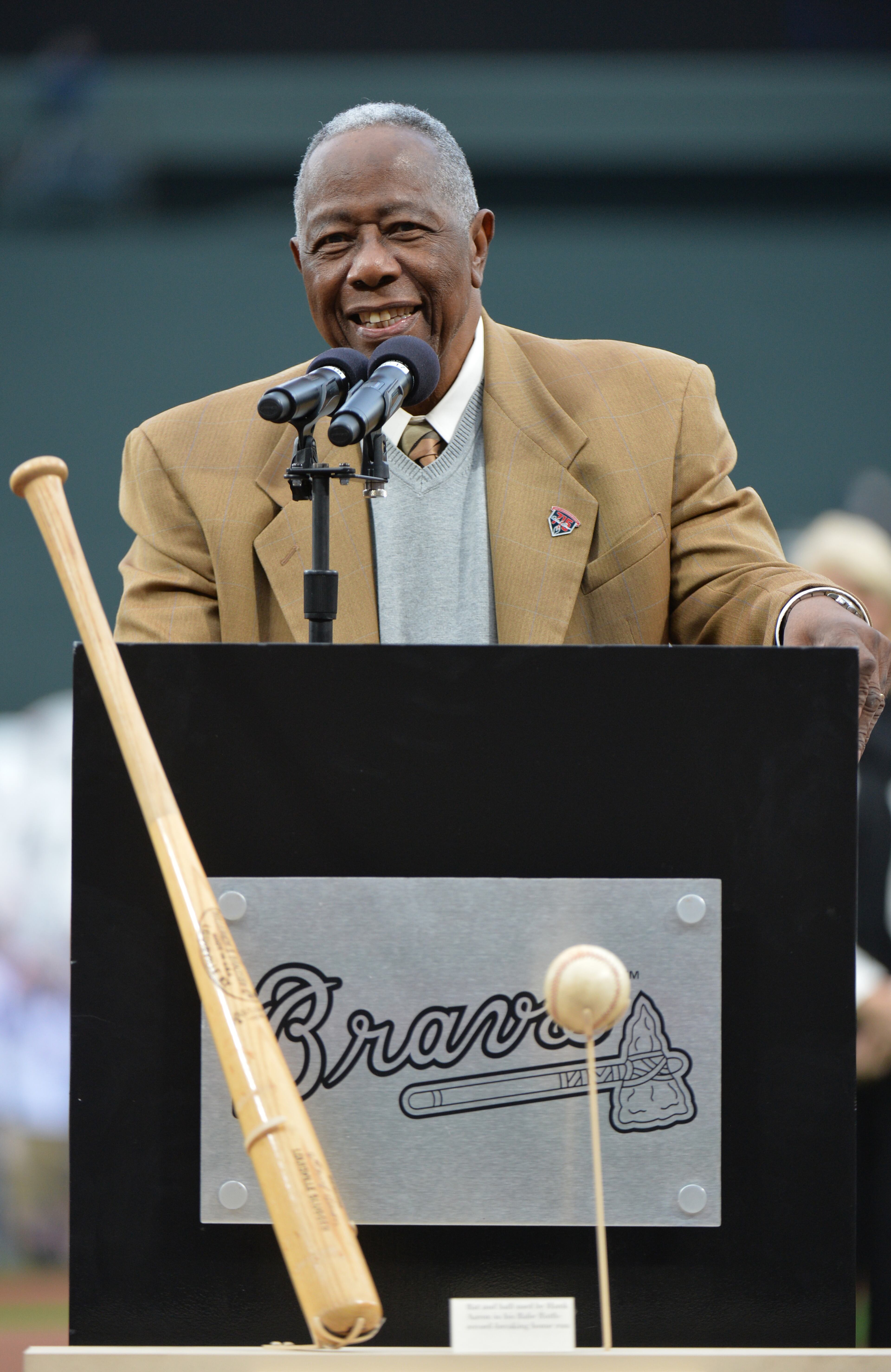 Hank Aaron speaks during a pregame ceremony to recognize the 40th anniversary of Hank Aaron's historic 715th home run before the season opener at Turner Field in Atlanta on Tuesday, April 8, 2014. HYOSUB SHIN / HSHIN@AJC.COM
