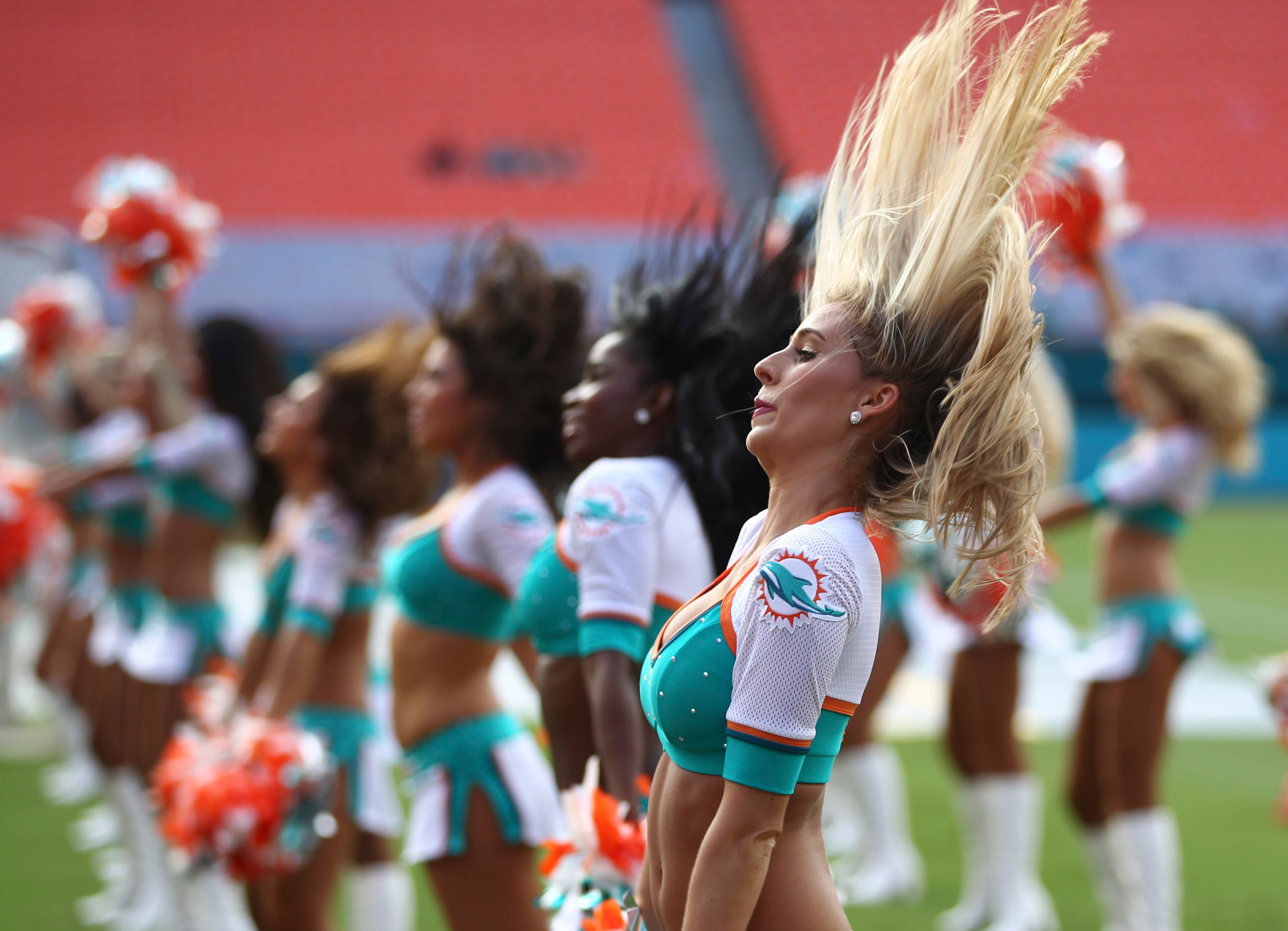 Miami Dolphins cheerleaders dance before a scrimmage.