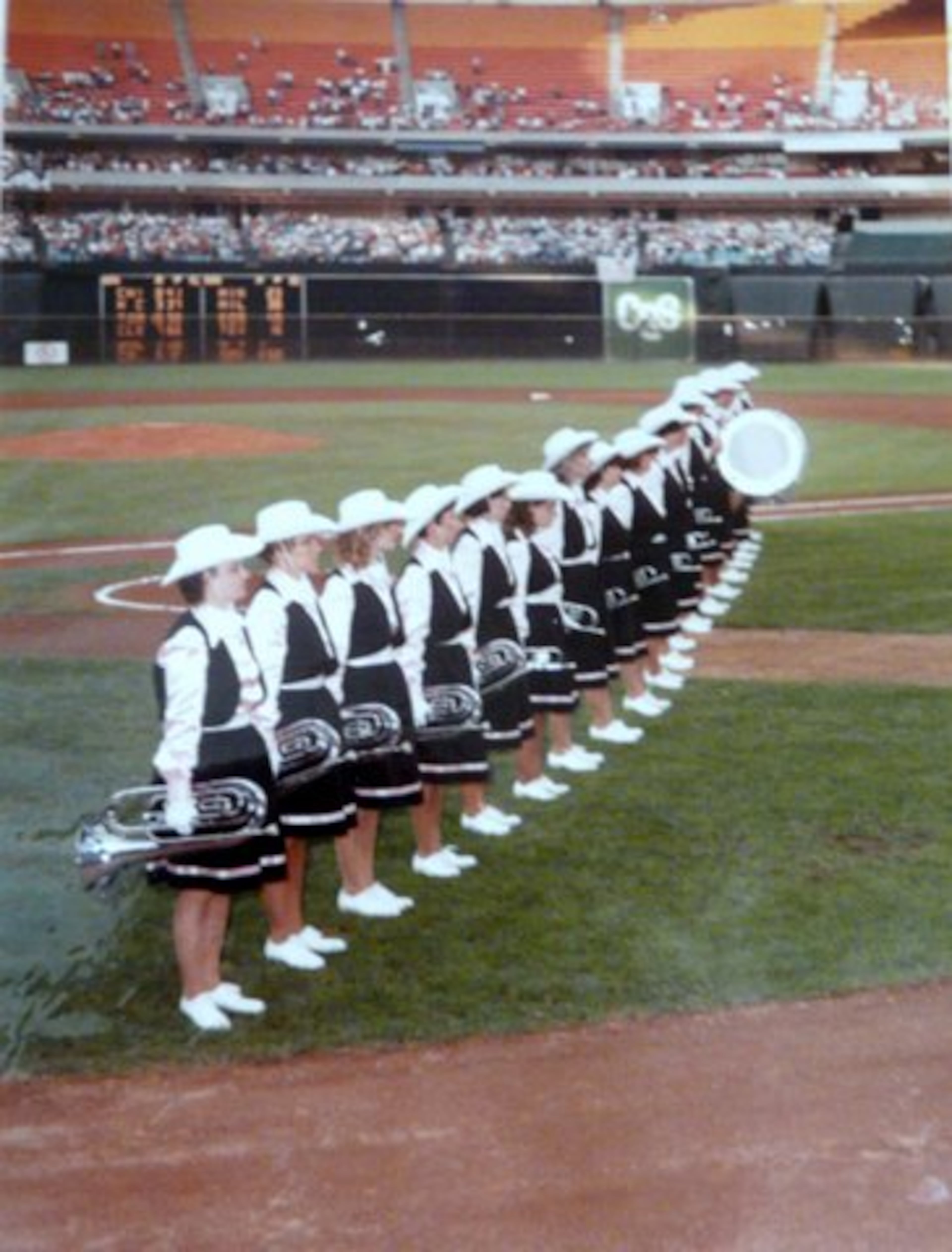 The Monroe Girls Drum and Bugle Corps perform at the Macy’s Thanksgiving Day parade in 1959. They disbanded in 1983 but will return Dec. 6 as co-grand marshals of the city’s 60th annual Christmas parade.