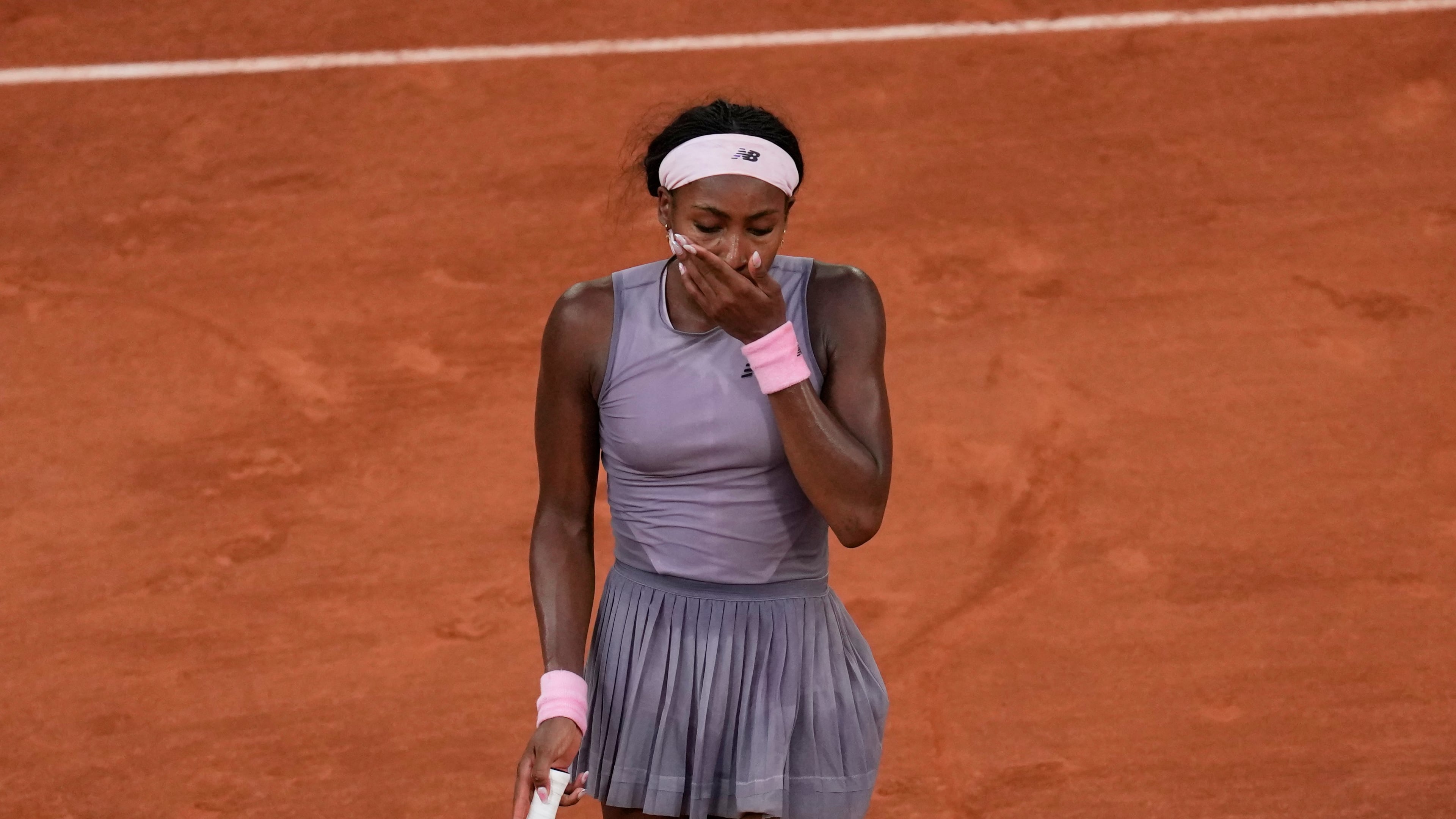 Coco Gauff of the U.S. reacts after the third round women's singles tennis match against Anastasia Potapova of Austria at the French Open tennis tournament in Paris, Saturday, May 30, 2026. (AP Photo/Christophe Ena)