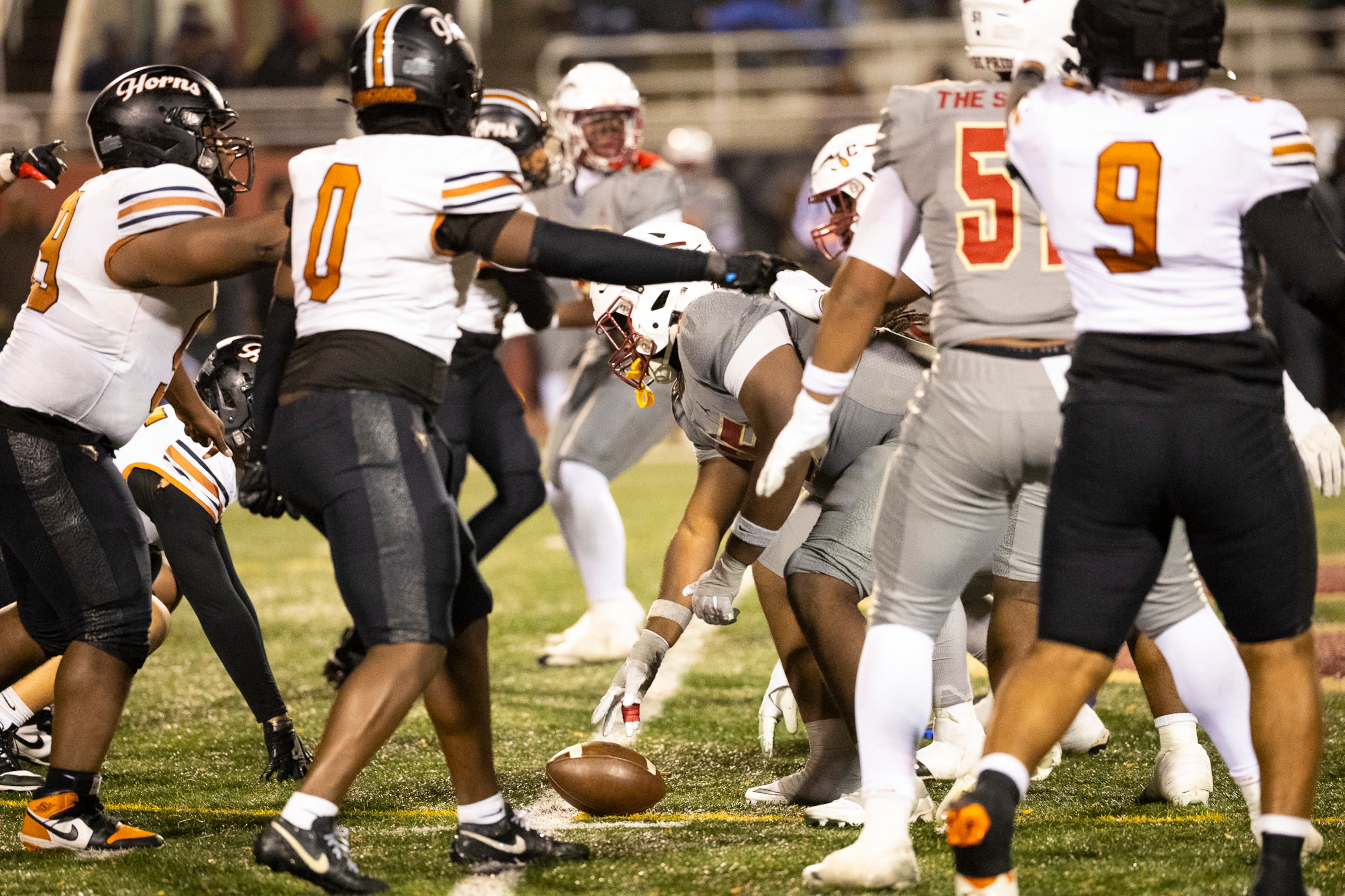 Creekside and Kell players get in formation during the second half of their Class 4A semifinal game on Friday, Dec. 5, 2025, at Creekside High School in Fairburn. (Oscar Guevara Saenz for the AJC)