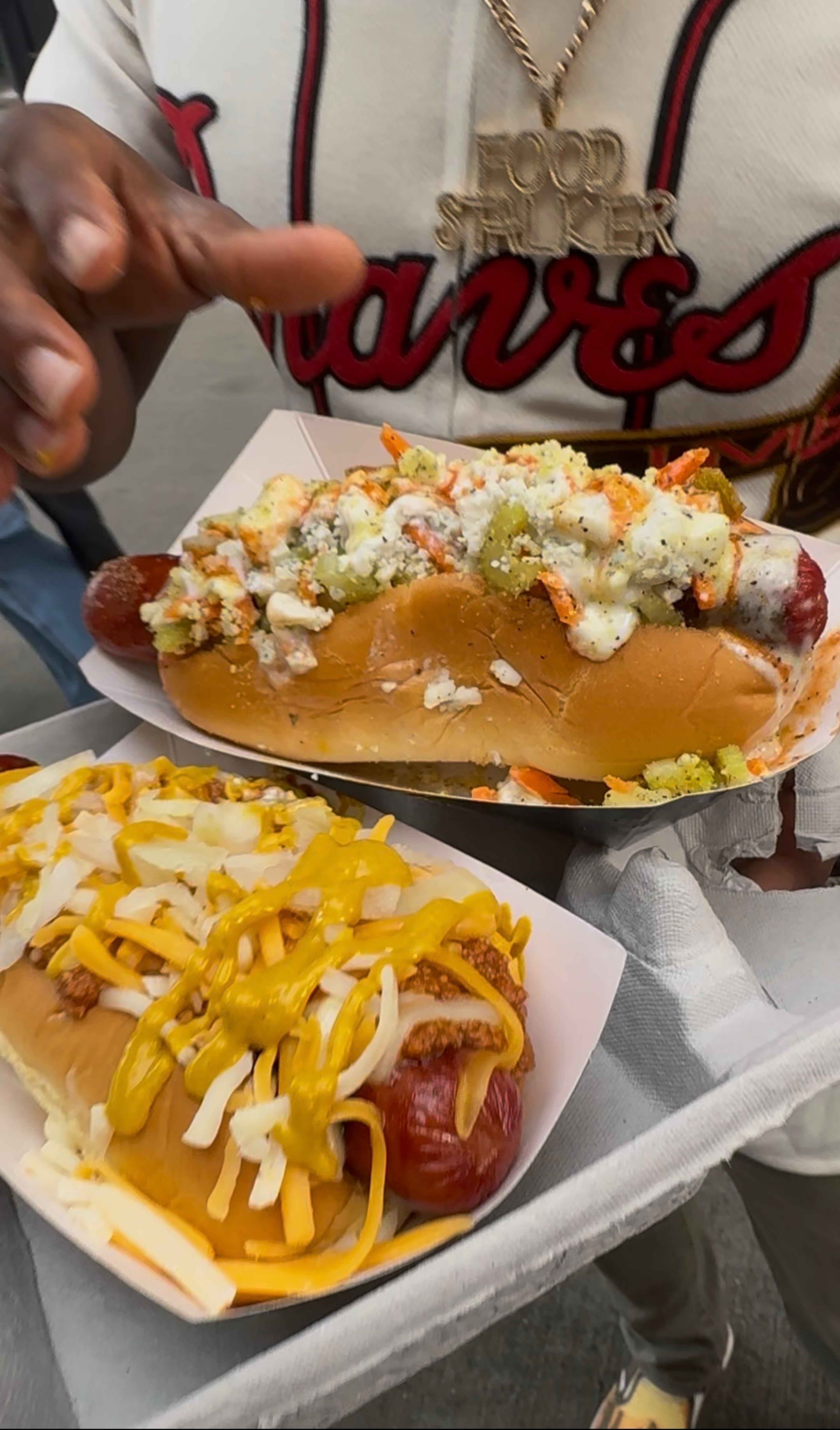 Loaded hot dogs from Pepper's. (Justin Brown for The Atlanta Journal-Constitution)
