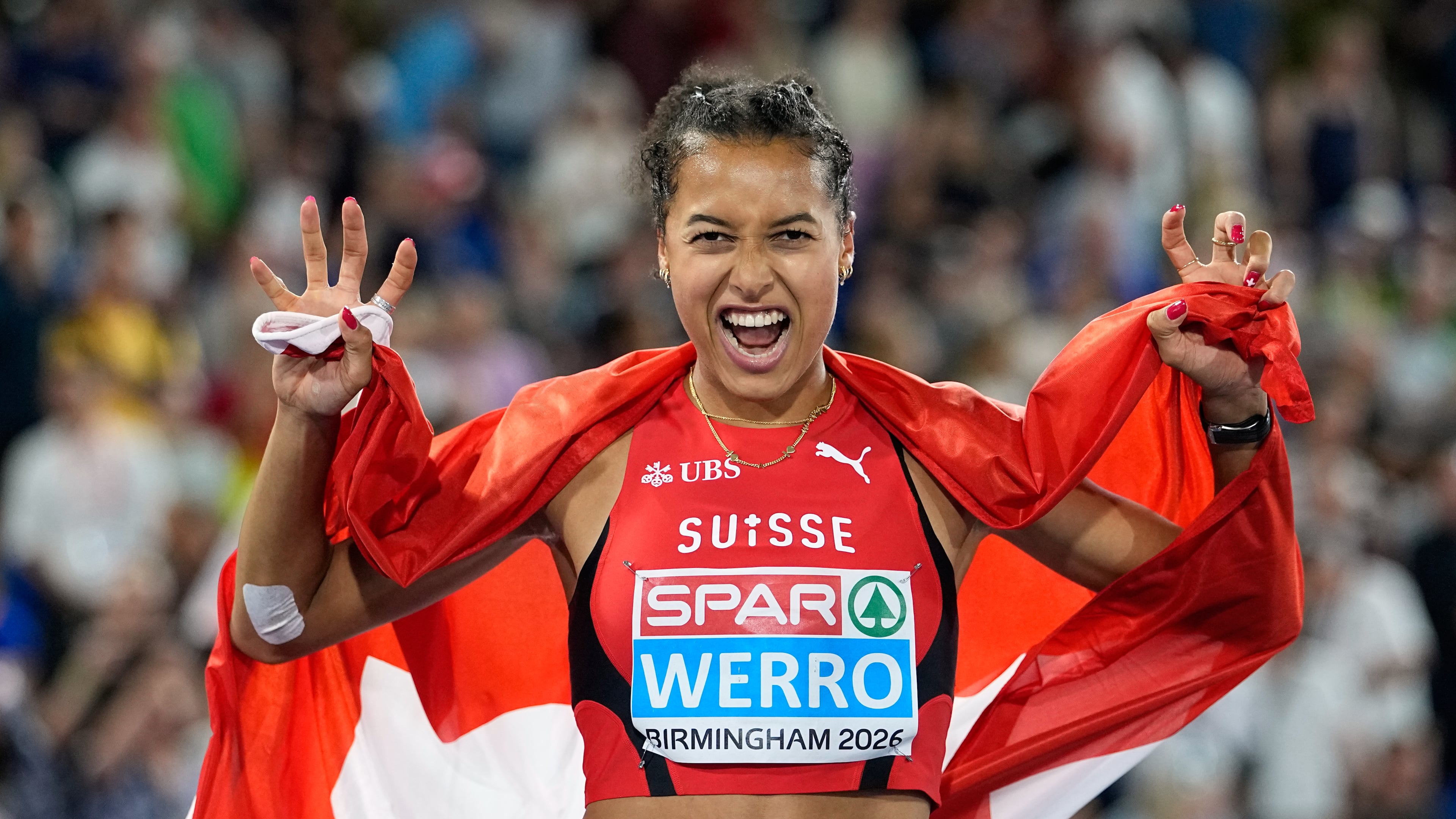 Audrey Werro of Switzerland poses after winning the gold medal in the women's 800 meters final at the European Athletics Championships in Birmingham, England, Friday, Aug. 14, 2026. (AP Photo/Matthias Schrader)