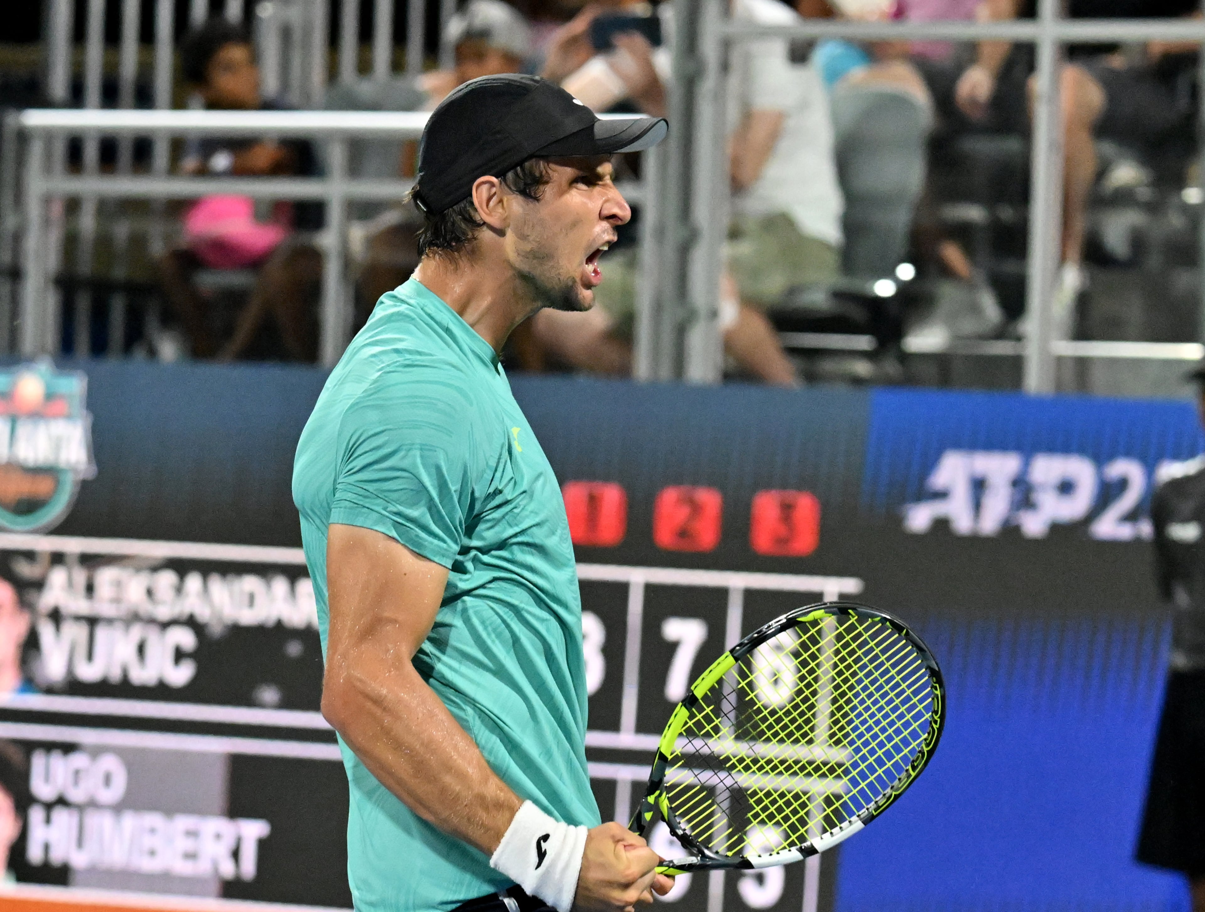 Aleksandar Vukic reacts as he beats Ugo Humbert during a semifinal match at the 2023 Atlanta Tennis Open at Atlantic Station, Saturday, July 29, 2023, in Atlanta. (Hyosub Shin / Hyosub.Shin@ajc.com)