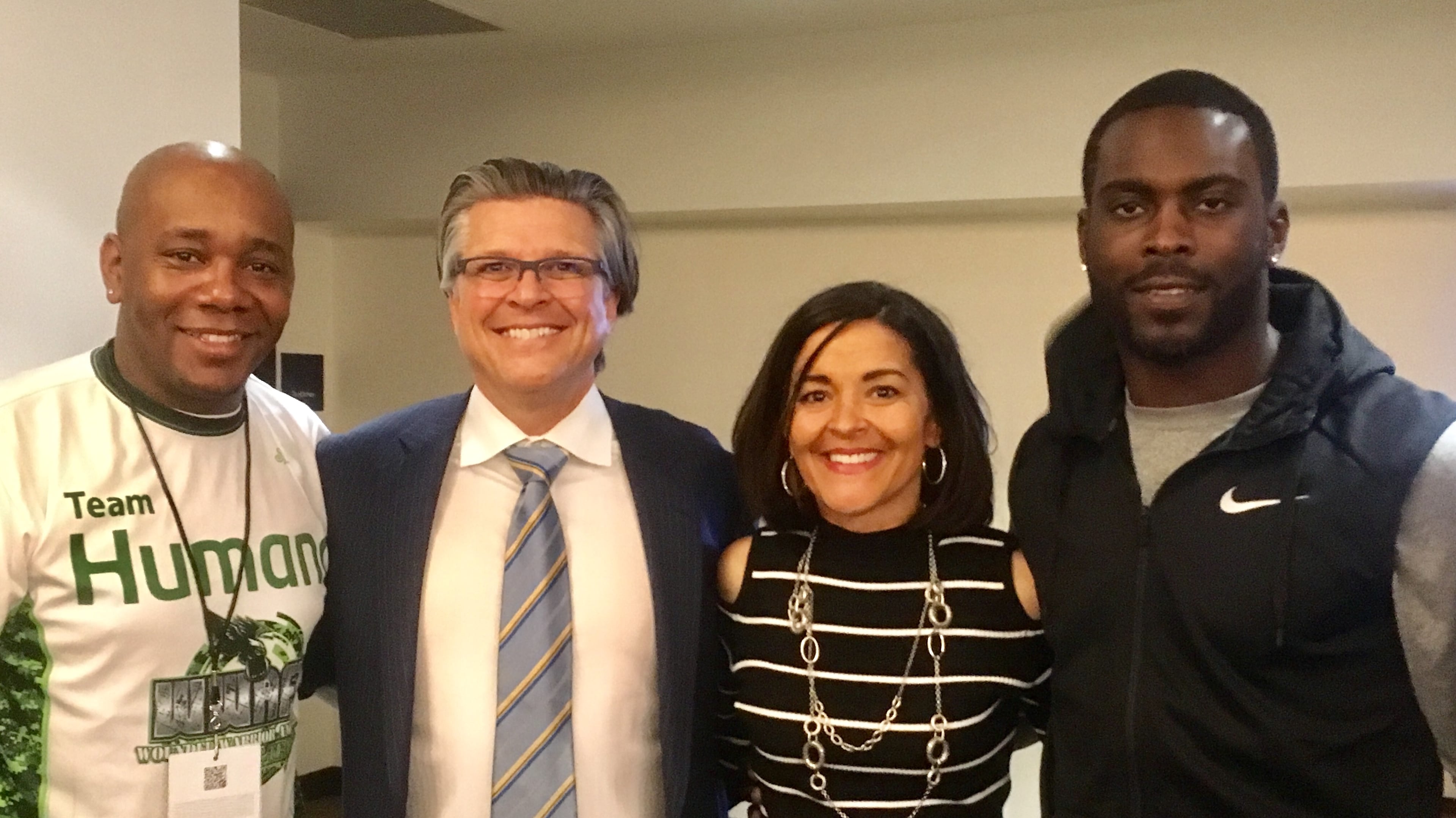 U.S. Army Sgt. First Class Michael Smith, Atlanta Dr. Mark Beaty, Sara White and former Falcons QB Michael Vick at a medically themed news conference in Houston. Photo: Jennifer Brett