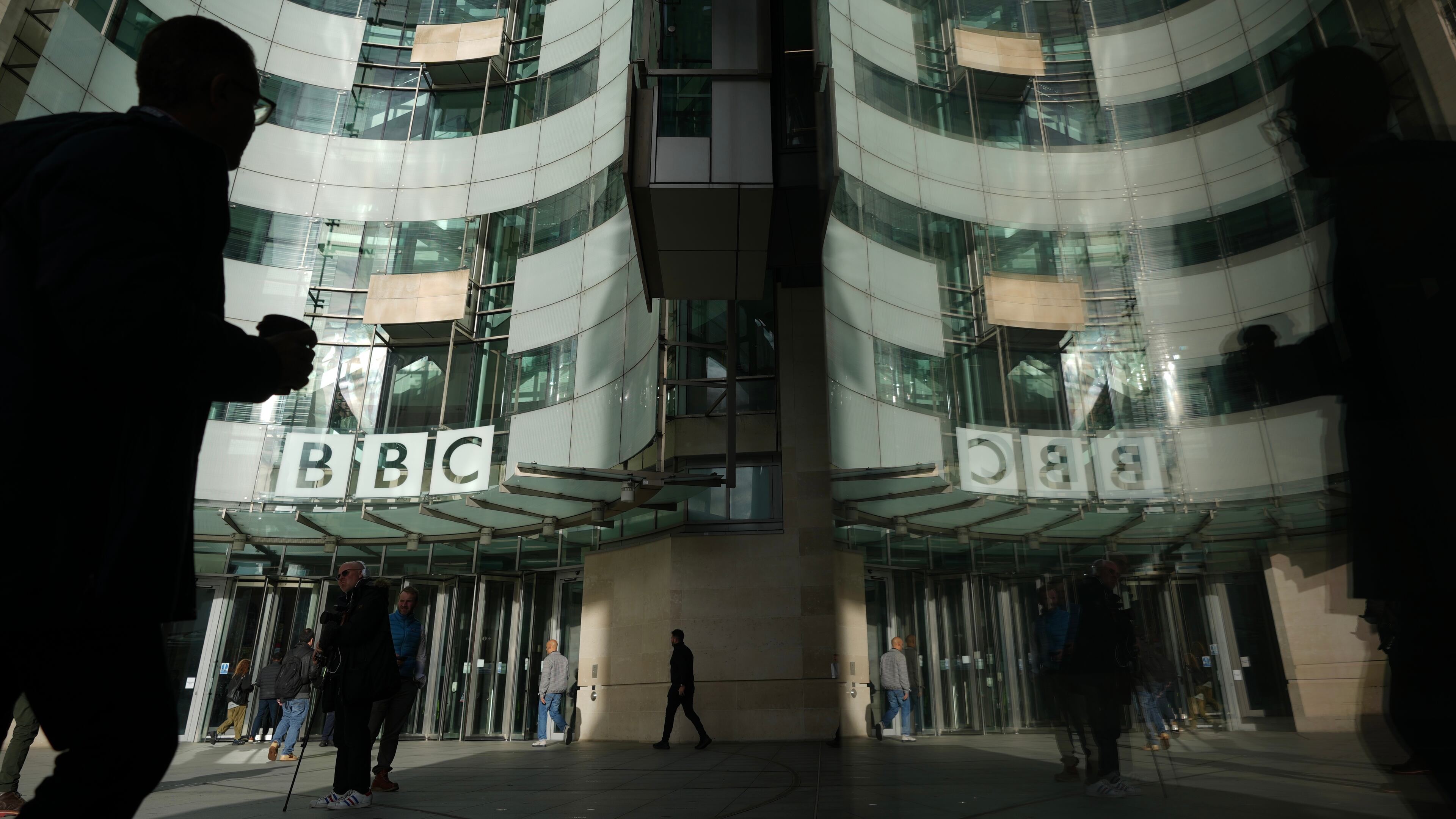FILE - Pedestrians walk outside the BBC Headquarters in London, Wednesday, Nov. 12, 2025. (AP Photo/Kin Cheung, file)