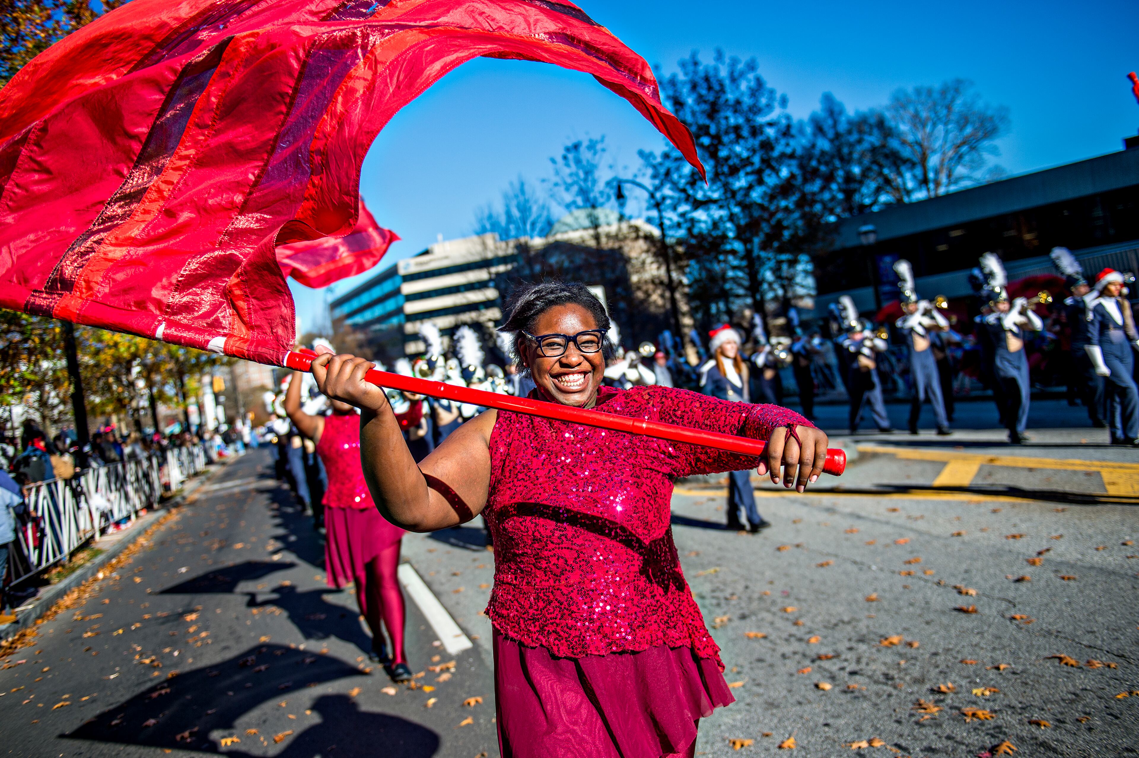 December 5, 2015 Atlanta - Chrystah Woods (left) marches in the 2015 Children's Christmas Parade in Atlanta on Saturday, December 5, 2015. Thousands gathered along Peachtree St. to watch the parade pass with marching bands, balloons, performances and more. JONATHAN PHILLIPS / SPECIAL