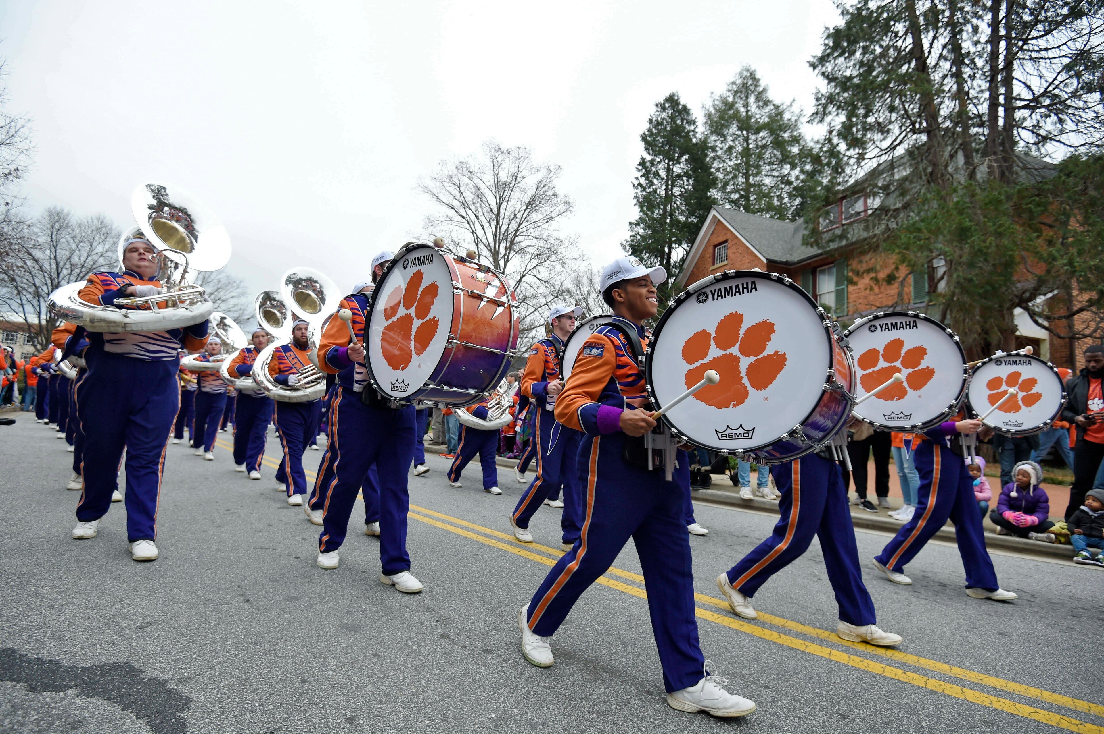 A band marches down the street during a parade honoring the Clemson Tigers, Saturday, Jan. 12, 2019, in Clemson, S.C., Clemson defeated Alabama 44-16 in the College Football Playoff championship game Monday Jan. 7. (AP Photo/Richard Shiro)