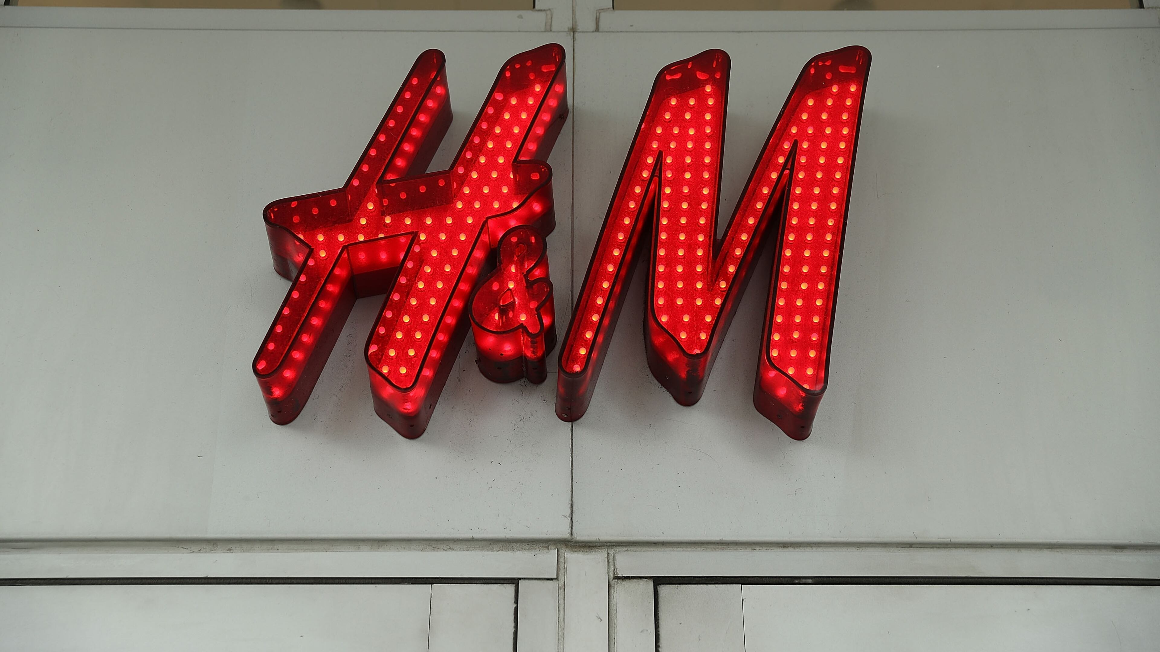 MIAMI BEACH, FL - JANUARY 09: A sign is seen on a H&M clothing store on January 9, 2018 in Miami Beach, Florida. H&M apologized on Monday after the Swedish clothing retailer's website in Britain showed a black child model wearing a hooded sweatshirt that said "coolest monkey in the jungle." (Photo by Joe Raedle/Getty Images)