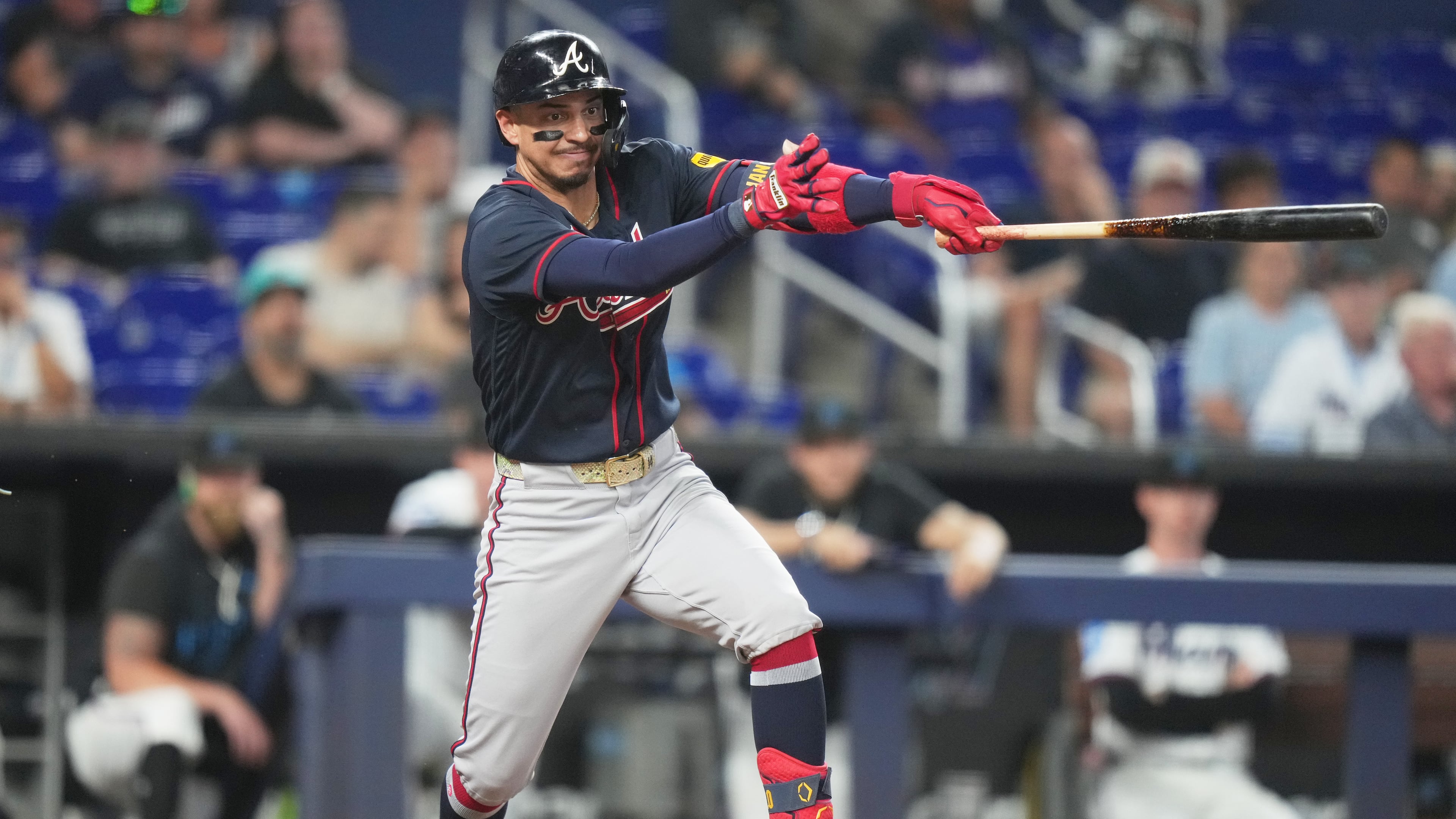 Atlanta Braves' Mauricio Dubón hits a RBI single to score Mike Yastrzemski during the eighth inning of a baseball game against the Miami Marlins, Tuesday, May 19, 2026, in Miami. (AP Photo/Lynne Sladky)