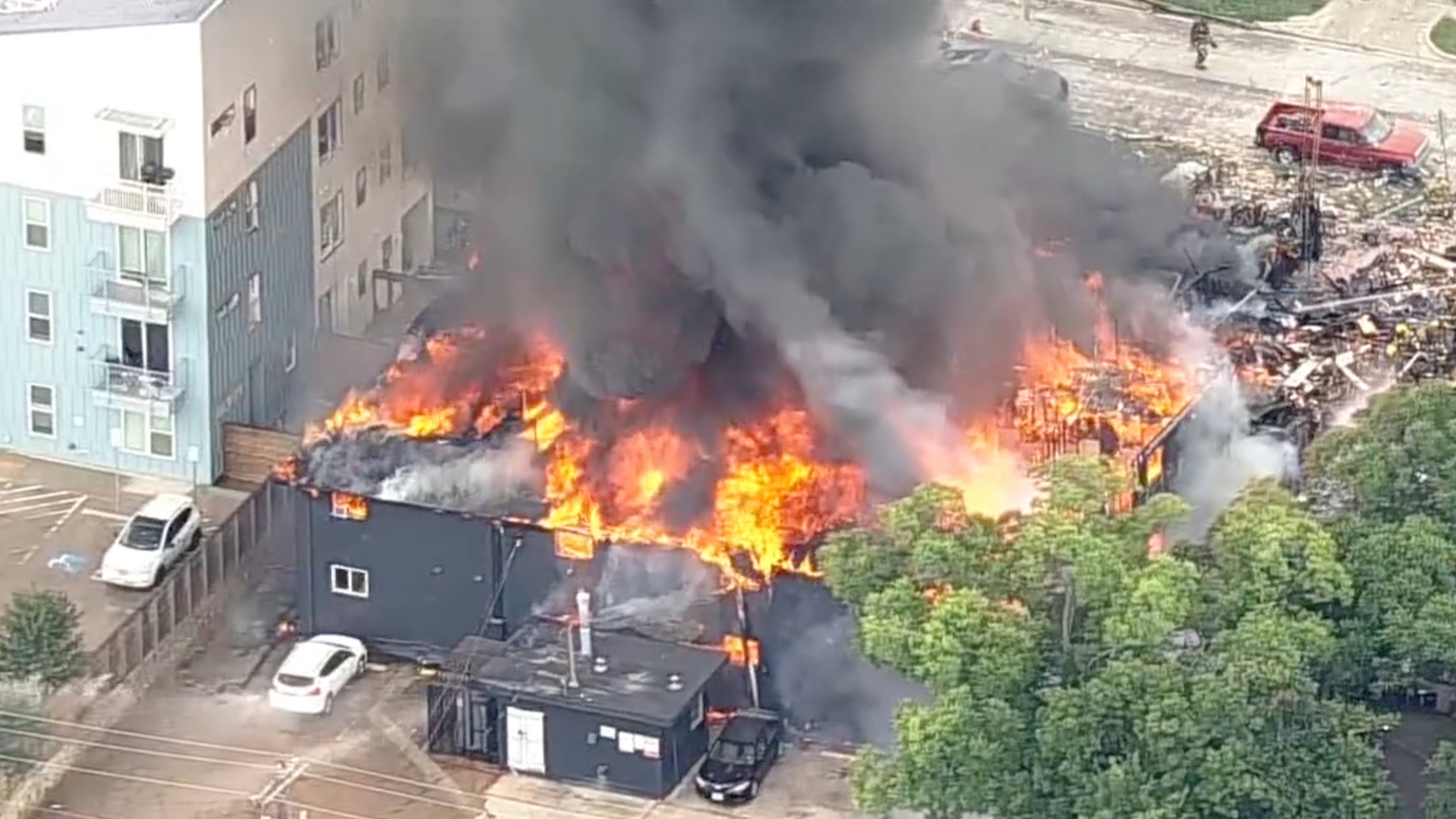 This image made from video provided by KDFW FOX 4 shows a large fire at an apartment complex in Dallas, Thursday, May 28, 2026. (KDFW FOX 4 via AP)
