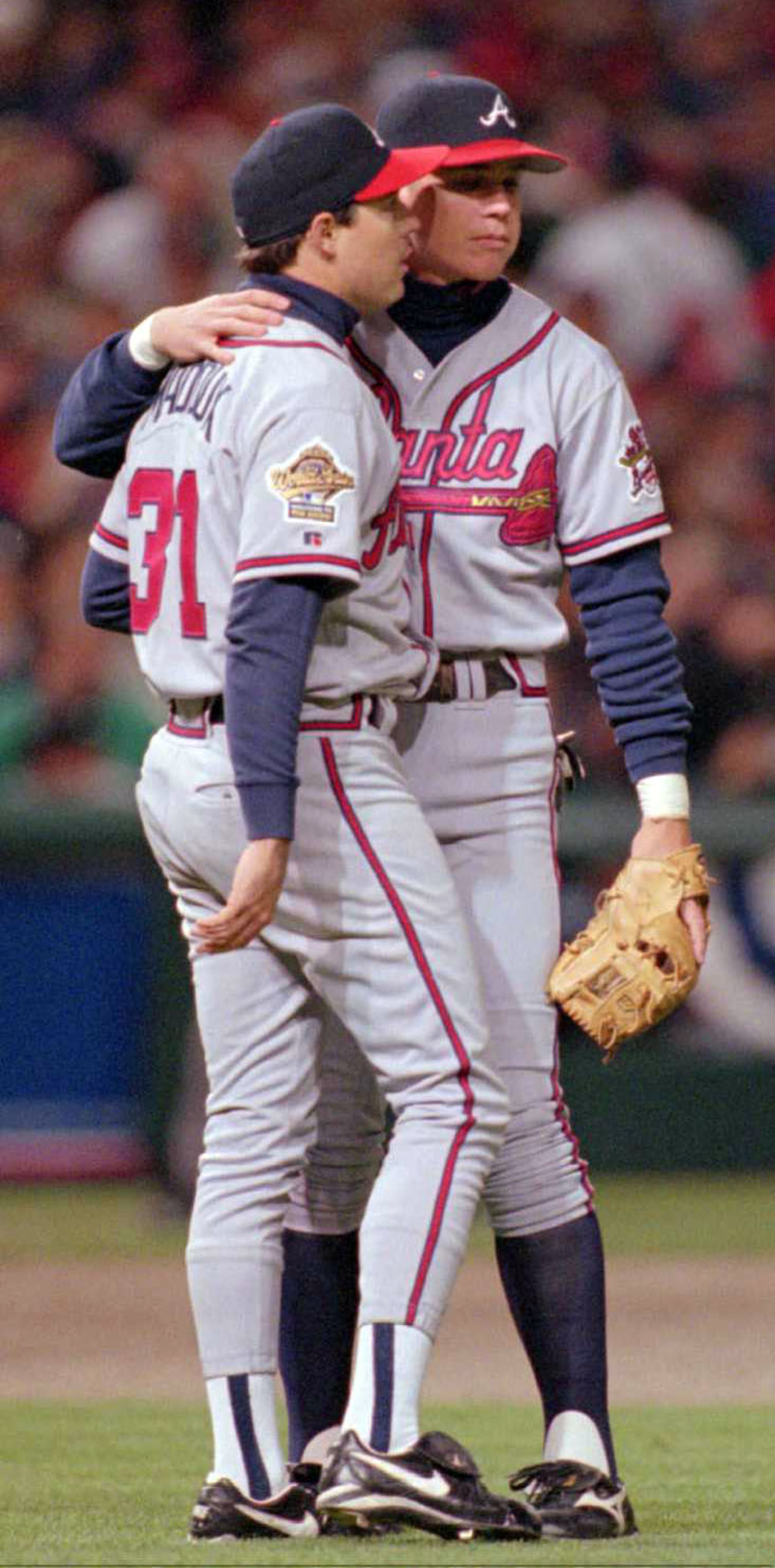OCTOBER 26, 1995 CLEVELAND 951026 Greg Maddux is being calmed down by catcher Chipper Jones in the 4th inning with 2 outs. SPORTS WORLD SERIES GAME 5. STAFF PHOTO BY:DAVID TULIS.