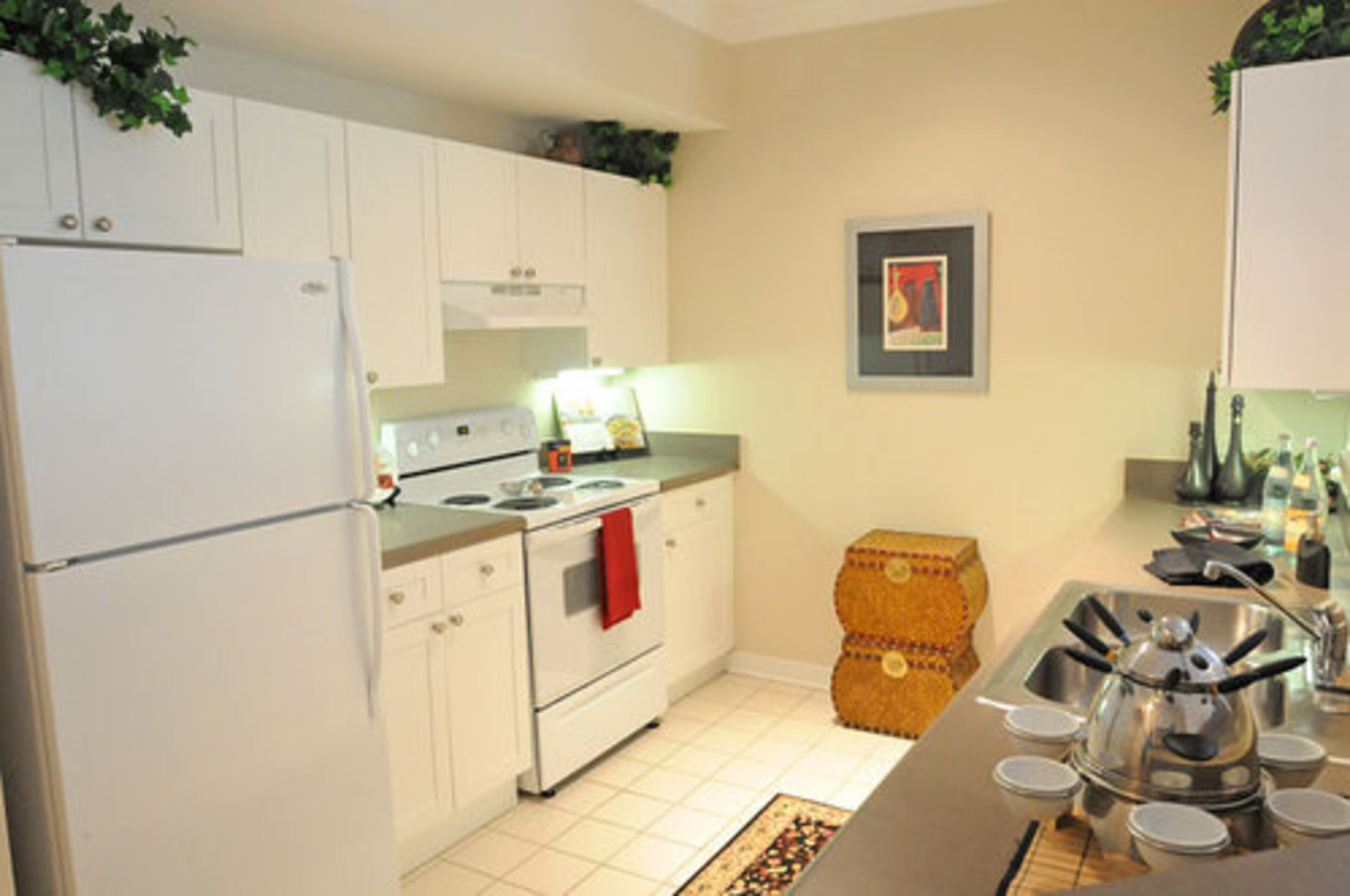 Kitchens feature granite countertops and the latest appliances.