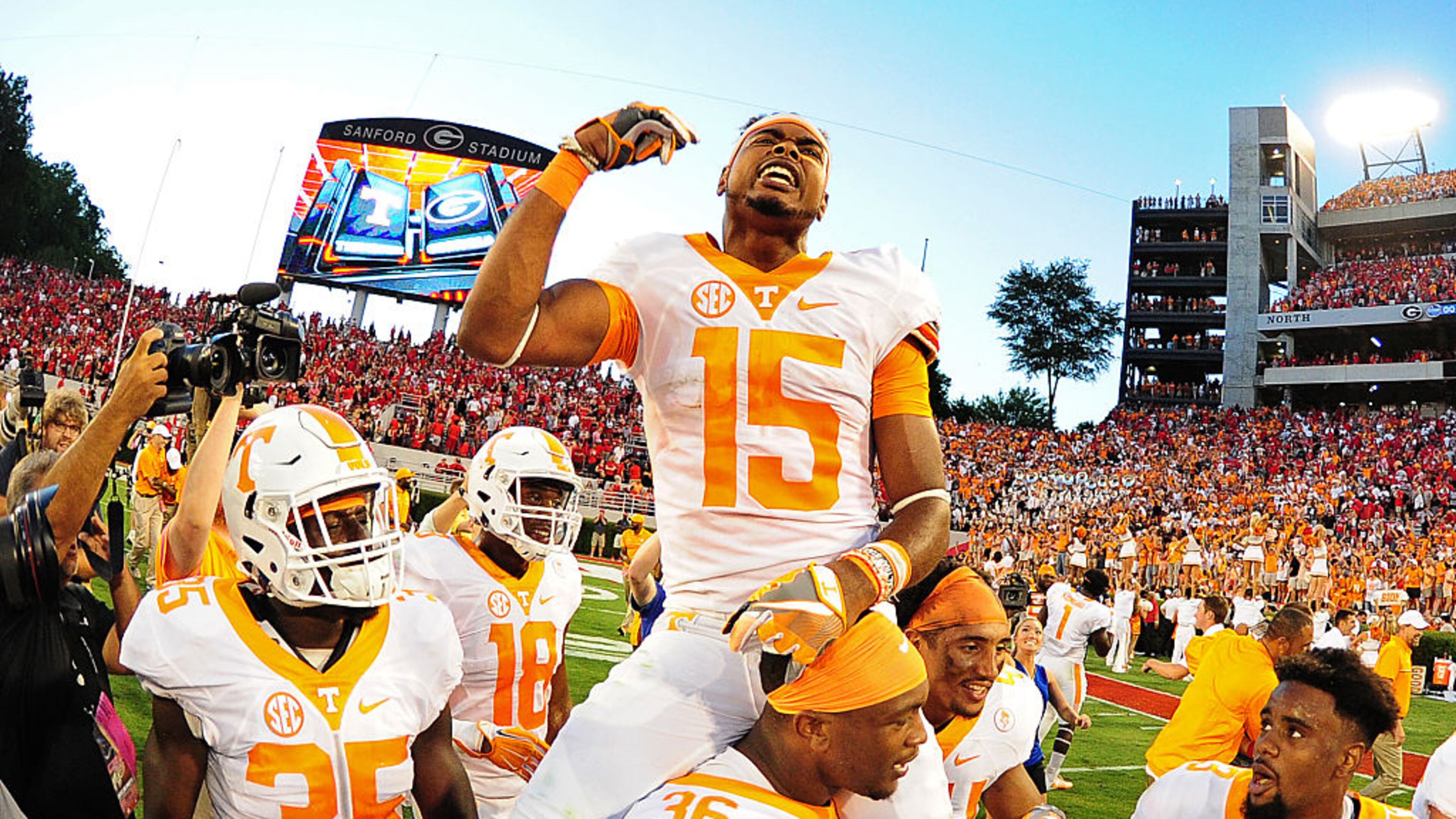 ATHENS, GA - OCTOBER 1: Jauan Jennings #15 of the Tennessee Volunteers rides the shoulders of Gavin Bryant #36 after making the game winning catch against the Georgia Bulldogs at Sanford Stadium on October 1, 2016 in Athens, Georgia. (Photo by Scott Cunningham/Getty Images)