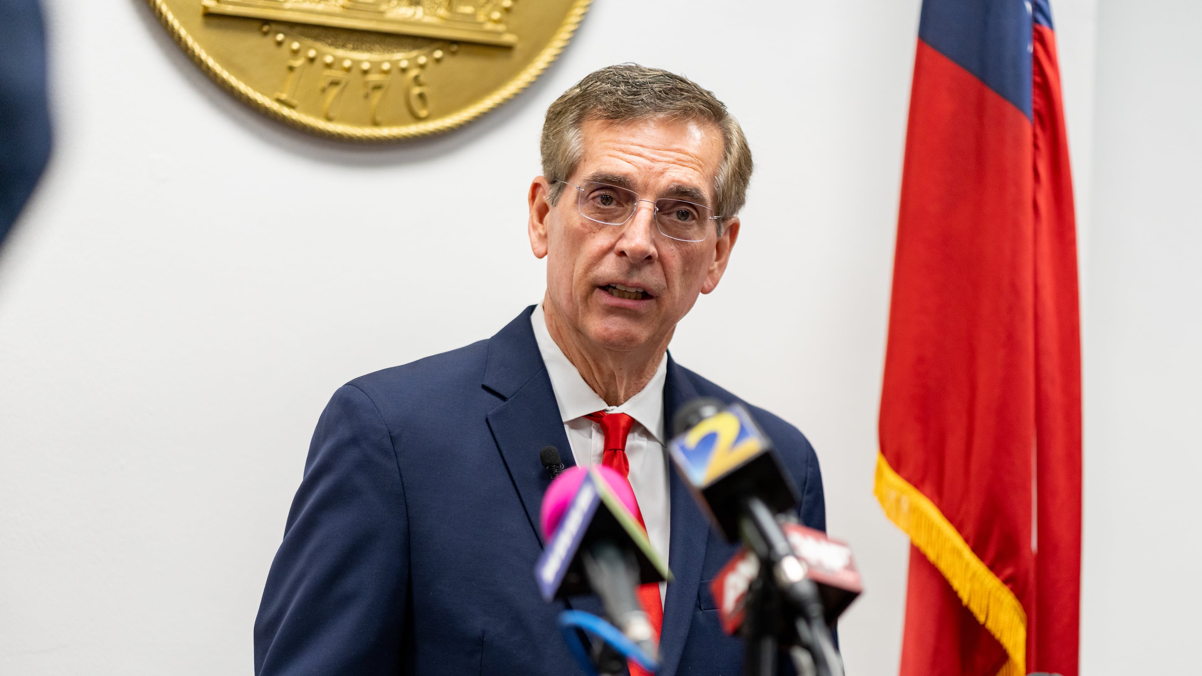 Secretary of State Brad Raffensperger gives an update on First Liberty Building & Loan's alleged Ponzi scheme April 1. (Ben Hendren for the AJC)