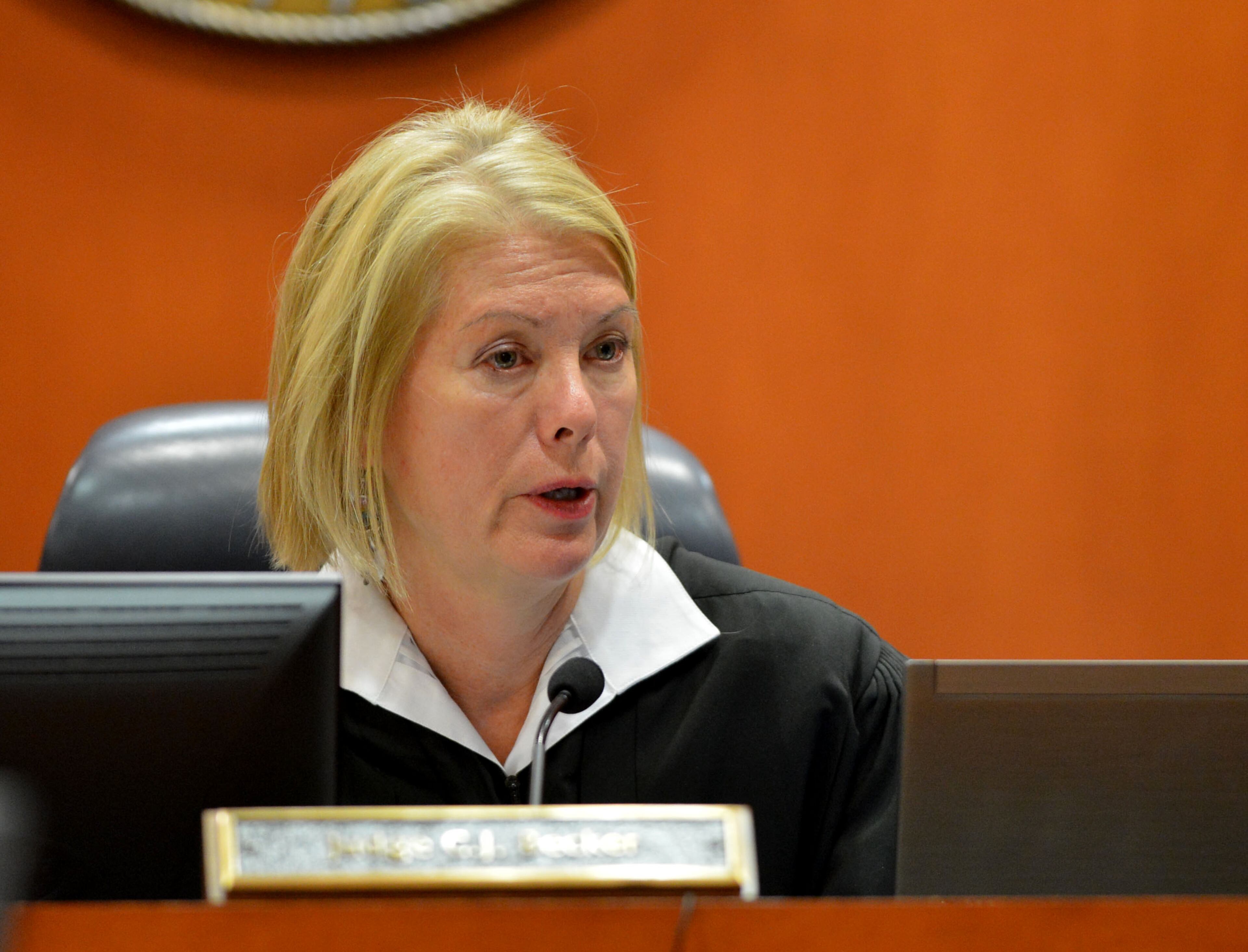 Judge Cynthia Becker polls jurors after their verdict Wednesday afternoon November 20, 2013.