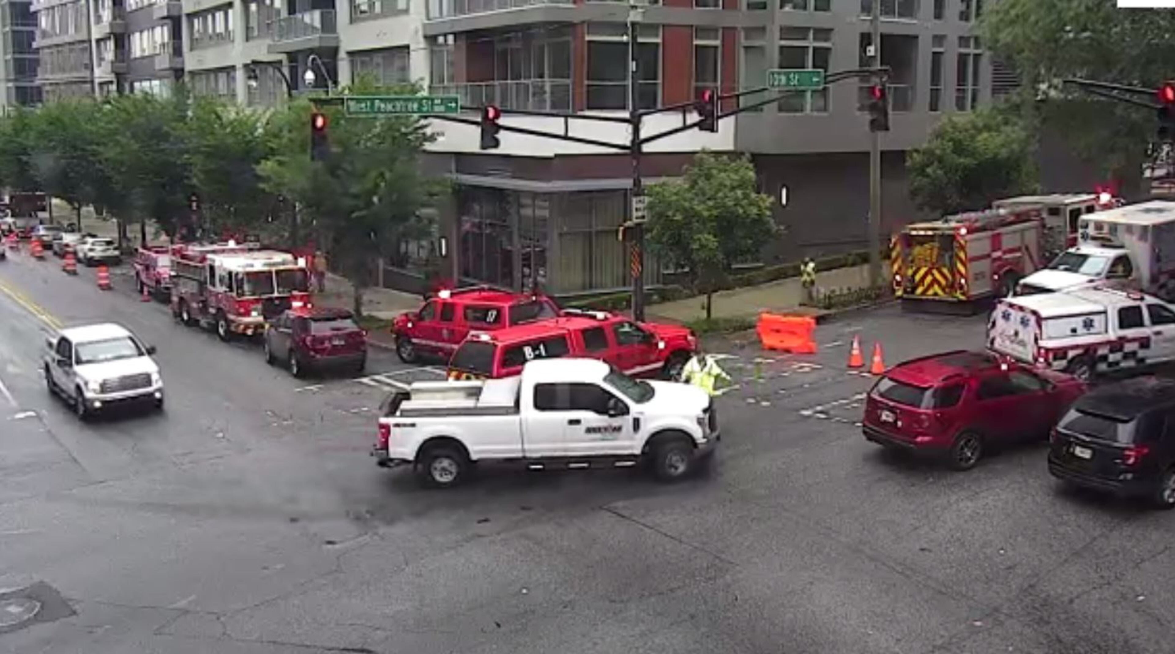 A crane malfunction at a construction site in Midtown left multiple people injured Monday afternoon, May 22, 2023. (Credit: WSB 24-hour Traffic Center)