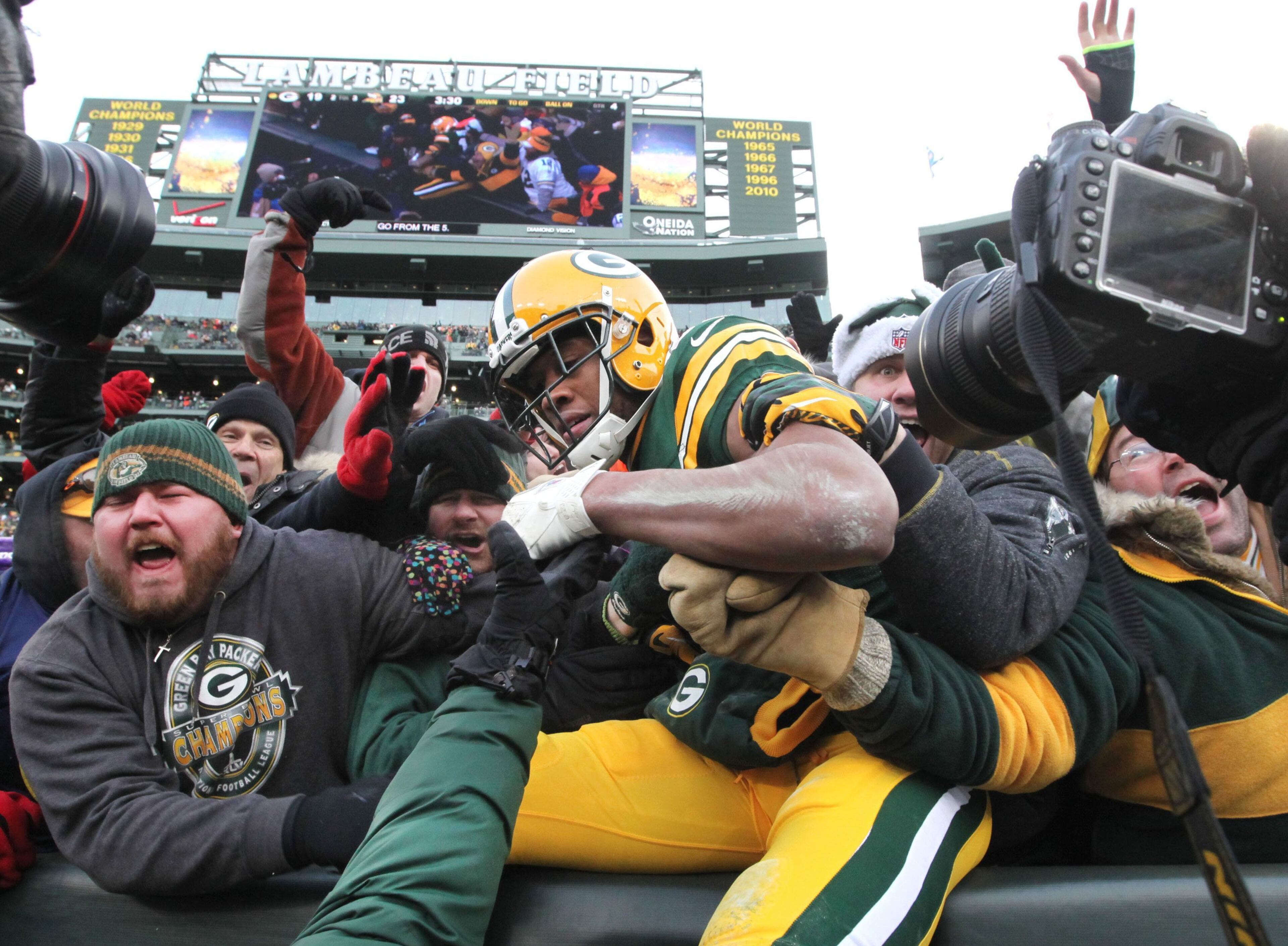Green Bay Packers wide receiver Jarrett Boykin (11) celebrates his touchdown catch during the fourth quarter at Lambeau Field in Green Bay, Wis., on Sunday, Nov. 24, 2013. The Green Bay Packers versus Minnesota Vikings? game ended in a 26-26 tie. (Mark Hoffman/Milwaukee Journal Sentinel/MCT)
