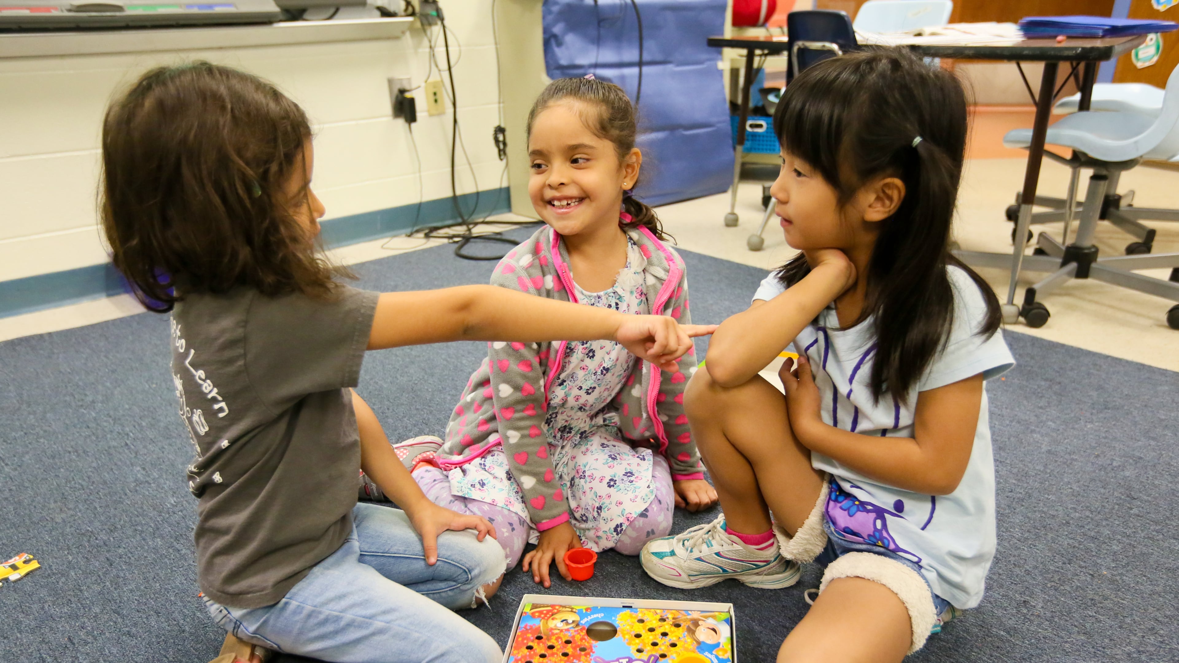 Students play games in English in a program for children learning English as their second language